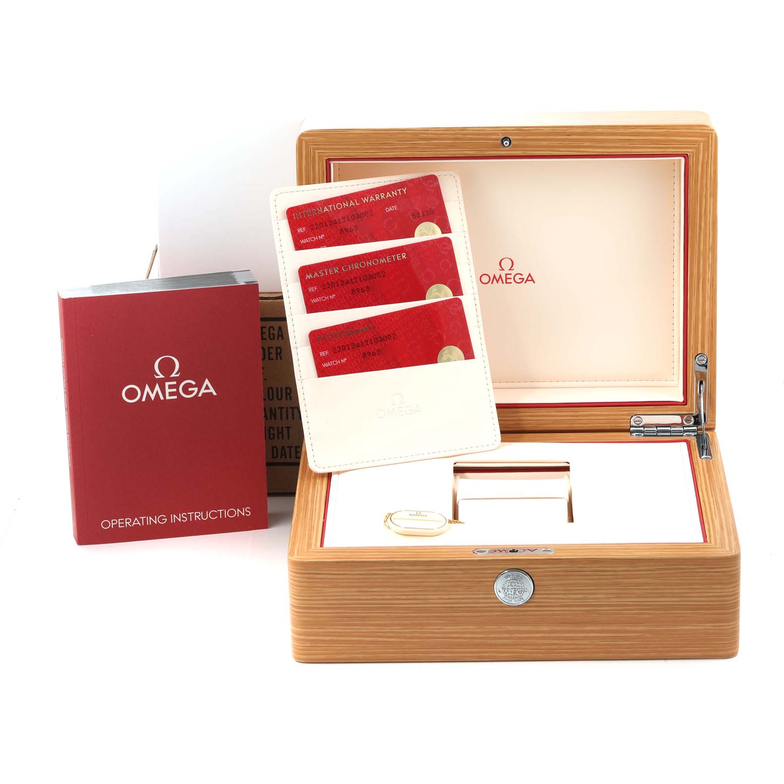 The image shows the Omega Aqua Terra 220.13.41.21.03.002 Men's Stainless Steel Blue Dial 220.13.41.21.03.002 Men's Stainless Steel Blue Dial watch's box with accessories including cards, an operating manual, and a wooden case.