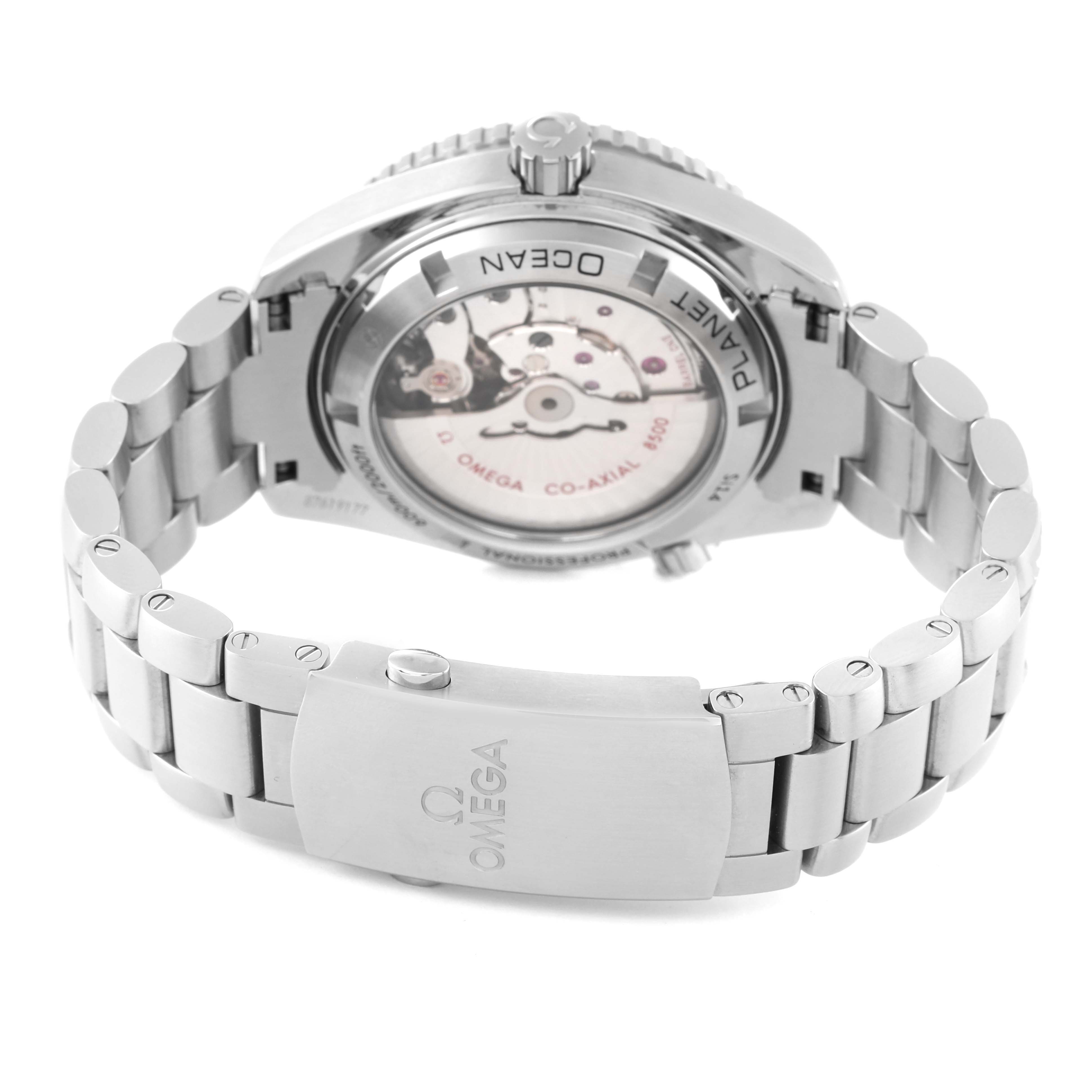 The image shows the back view of an Omega Planet Ocean 232.30.42.21.01.003 Men
s Stainless Steel Black Dial 232.30.42.21.01.003 Men
s Stainless Steel Black Dial model watch, highlighting its movement and stainless steel bracelet.