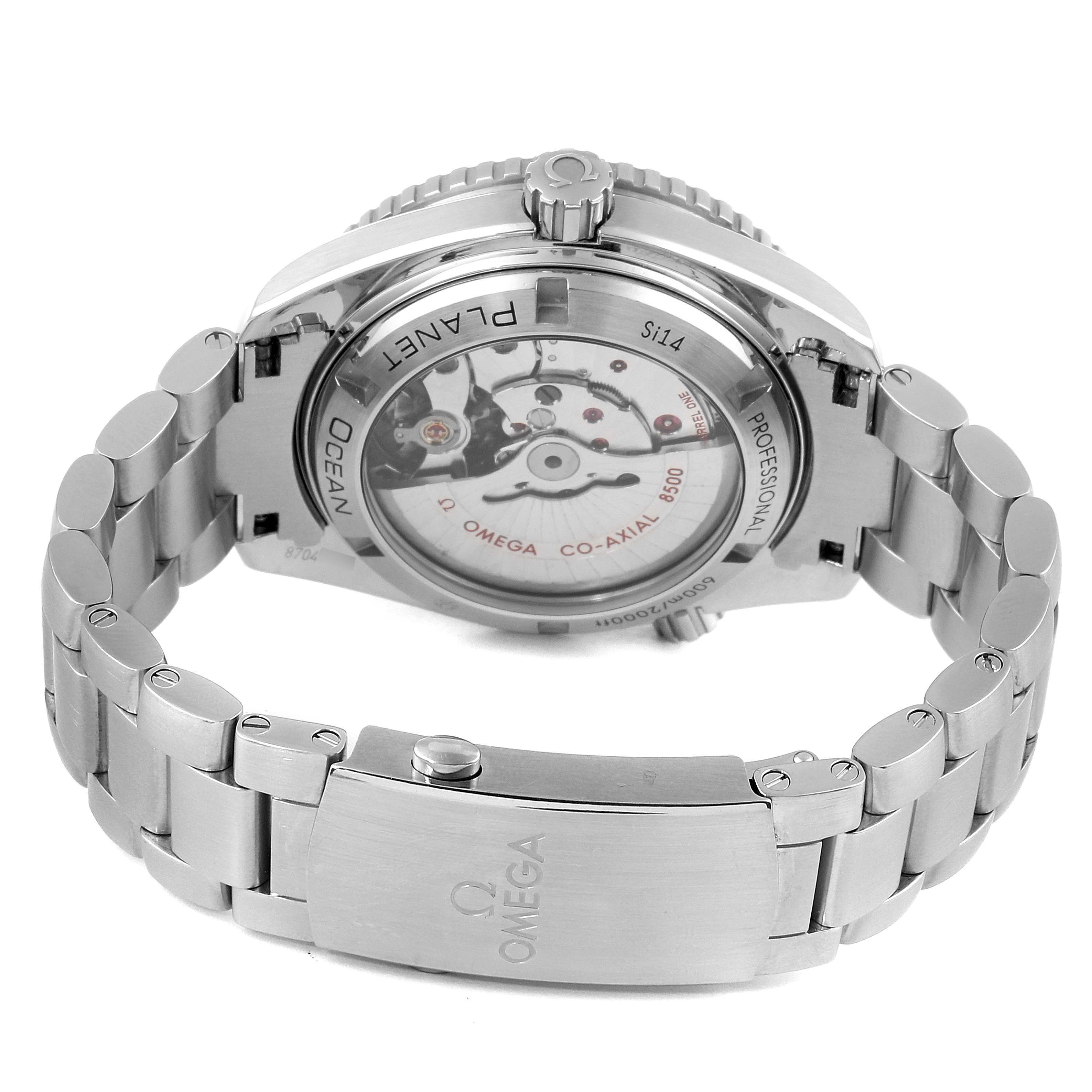 The image shows the back view of the Omega Planet Ocean 232.30.42.21.01.003 Men's Stainless Steel Black Dial 232.30.42.21.01.003 Men's Stainless Steel Black Dial watch, highlighting its movement and stainless steel bracelet.