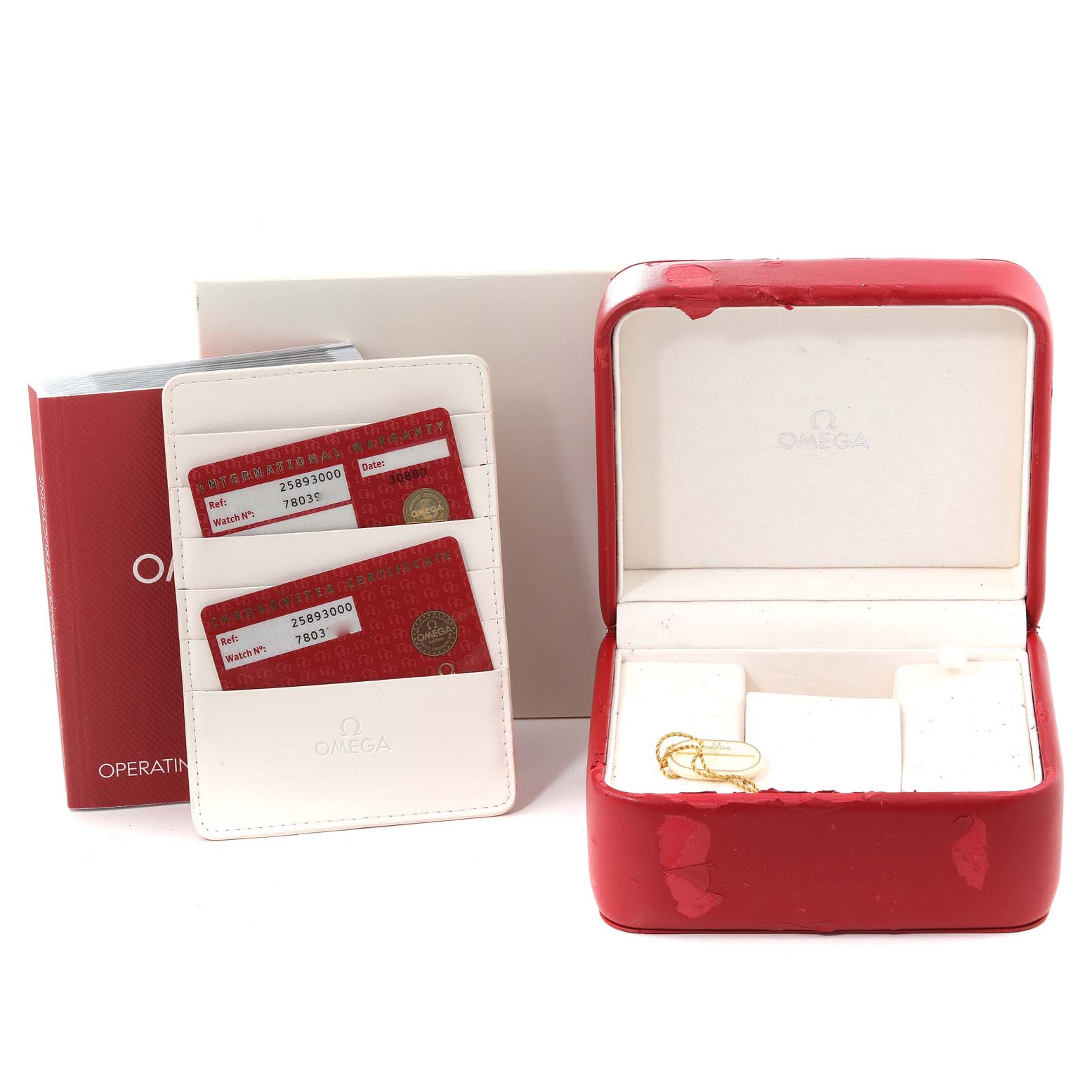 The image shows a red Omega Seamaster 2589.30.00 Men
s Stainless Steel Silver Dial 2589.30.00 Men
s Stainless Steel Silver Dial watch box, an instruction manual, and warranty cards in a white holder.
