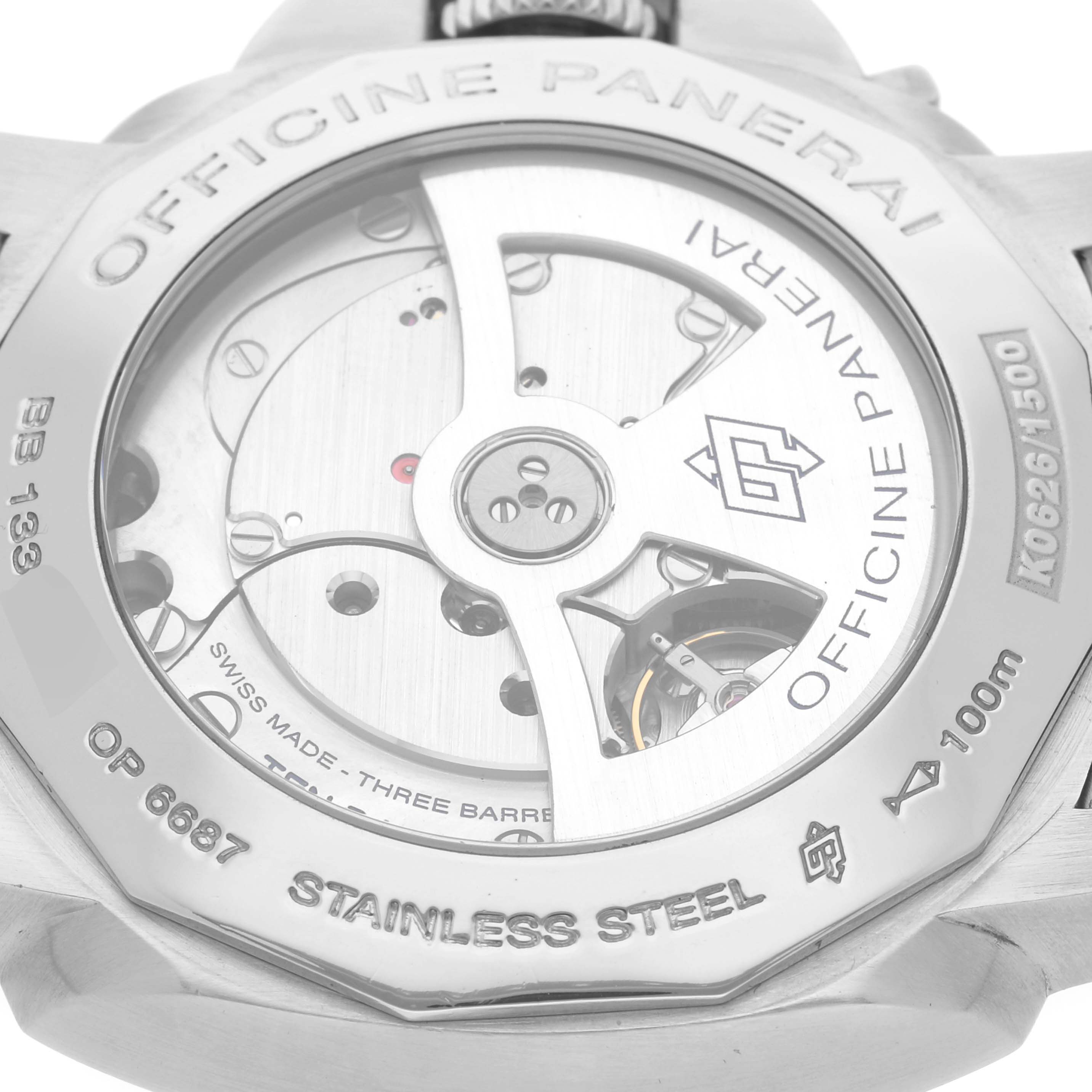 The image shows the back view of a Luminor model by Panerai, displaying the watch's internal mechanism and engravings.