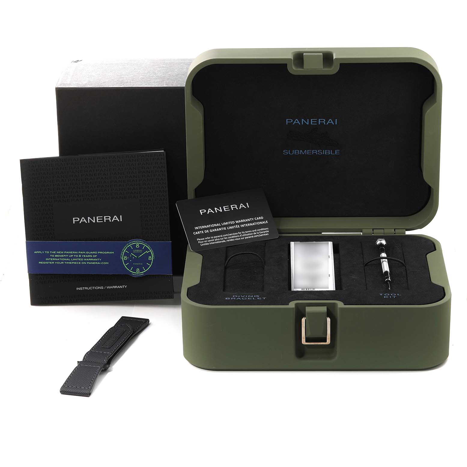 The image shows an open box set with accessories for the Panerai Submersible PAM00979 Men's Ceramic Grey Dial PAM00979 Men's Ceramic Grey Dial model, including a strap and tool, viewed from above.