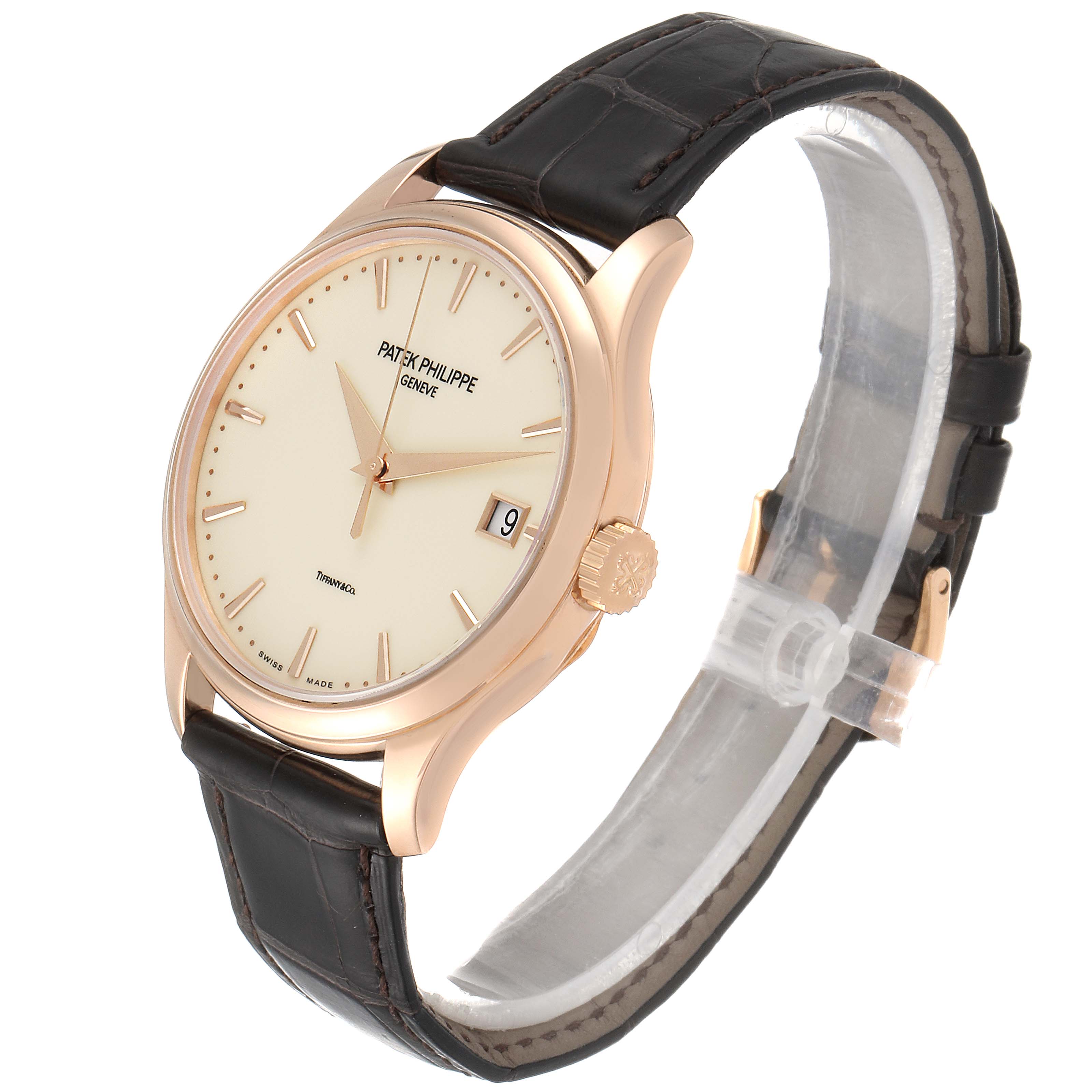 This image shows the Patek Philippe Calatrava 5227R Men
s Rose Gold Beige Dial 5227R Men
s Rose Gold Beige Dial model watch at a front-side angle, highlighting the dial, crown, and leather strap.