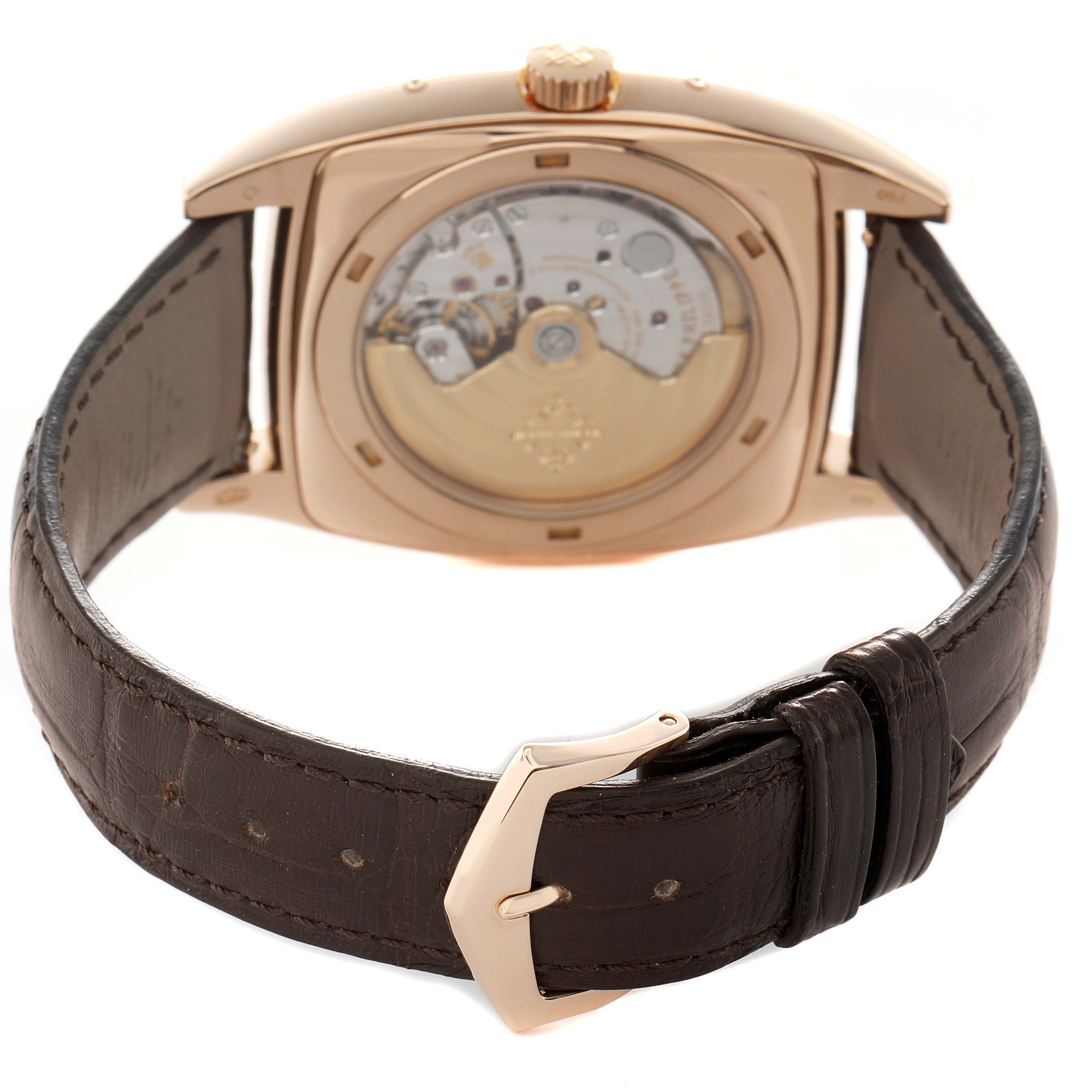 The Patek Philippe Gondolo 5135 5135R Men's Rose Gold White Dial watch is shown from the back, displaying its transparent case back and leather strap.