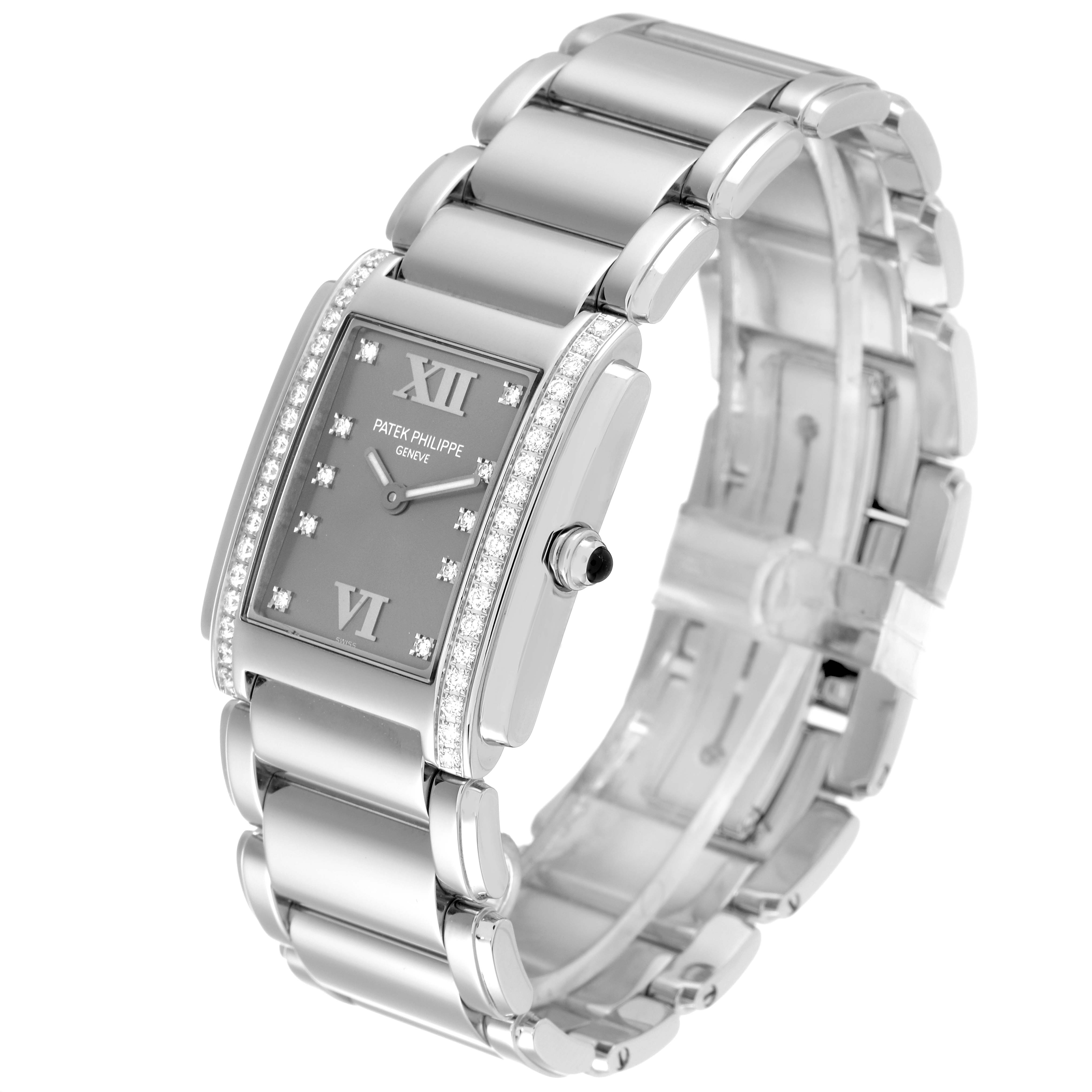 The image shows an angled view of the Patek Philippe Twenty-4 4910/010 Women's Stainless Steel Grey Dial 4910/010 Women's Stainless Steel Grey Dial watch, highlighting its dial, bracelet, and diamond-set case.