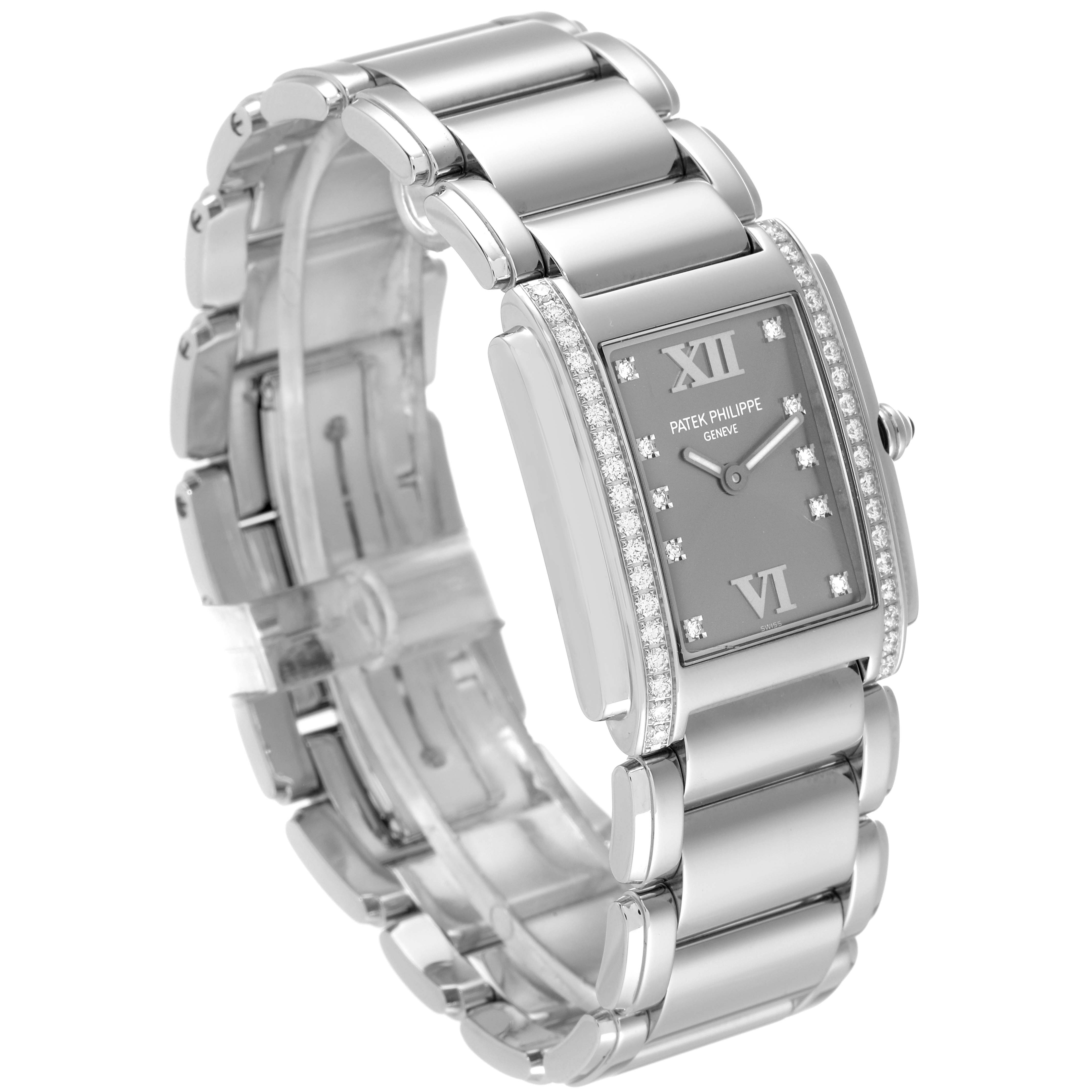 The image shows a side angle view of a Patek Philippe Twenty-4 4910/010 Women's Stainless Steel Grey Dial 4910/010 Women's Stainless Steel Grey Dial watch, highlighting its bracelet and rectangular case adorned with diamonds.