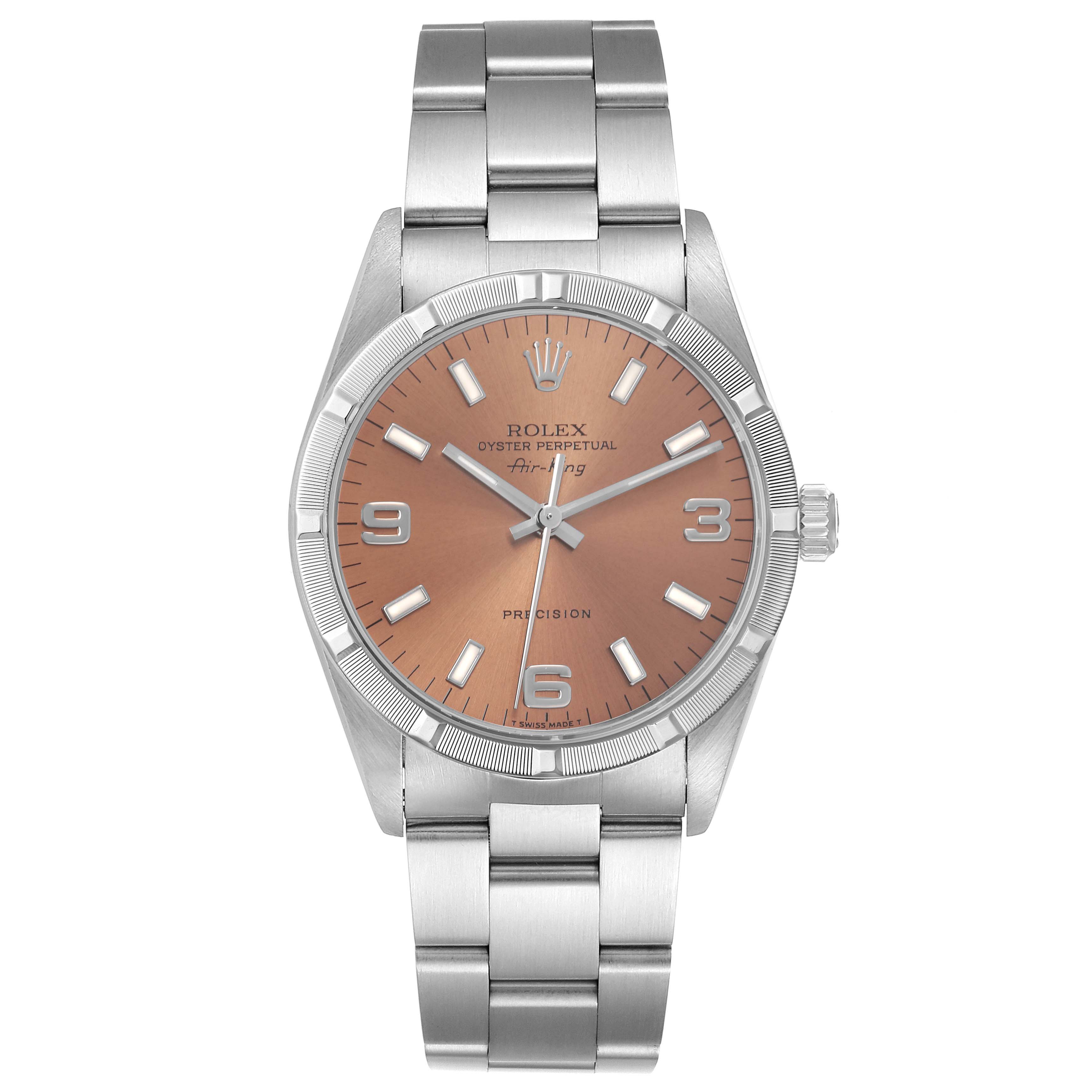 The Rolex Air-King 14010 Men's Stainless Steel Pink Dial 14010 Men's Stainless Steel Pink Dial watch is shown from a front view, displaying its face, bezel, lugs, and bracelet.