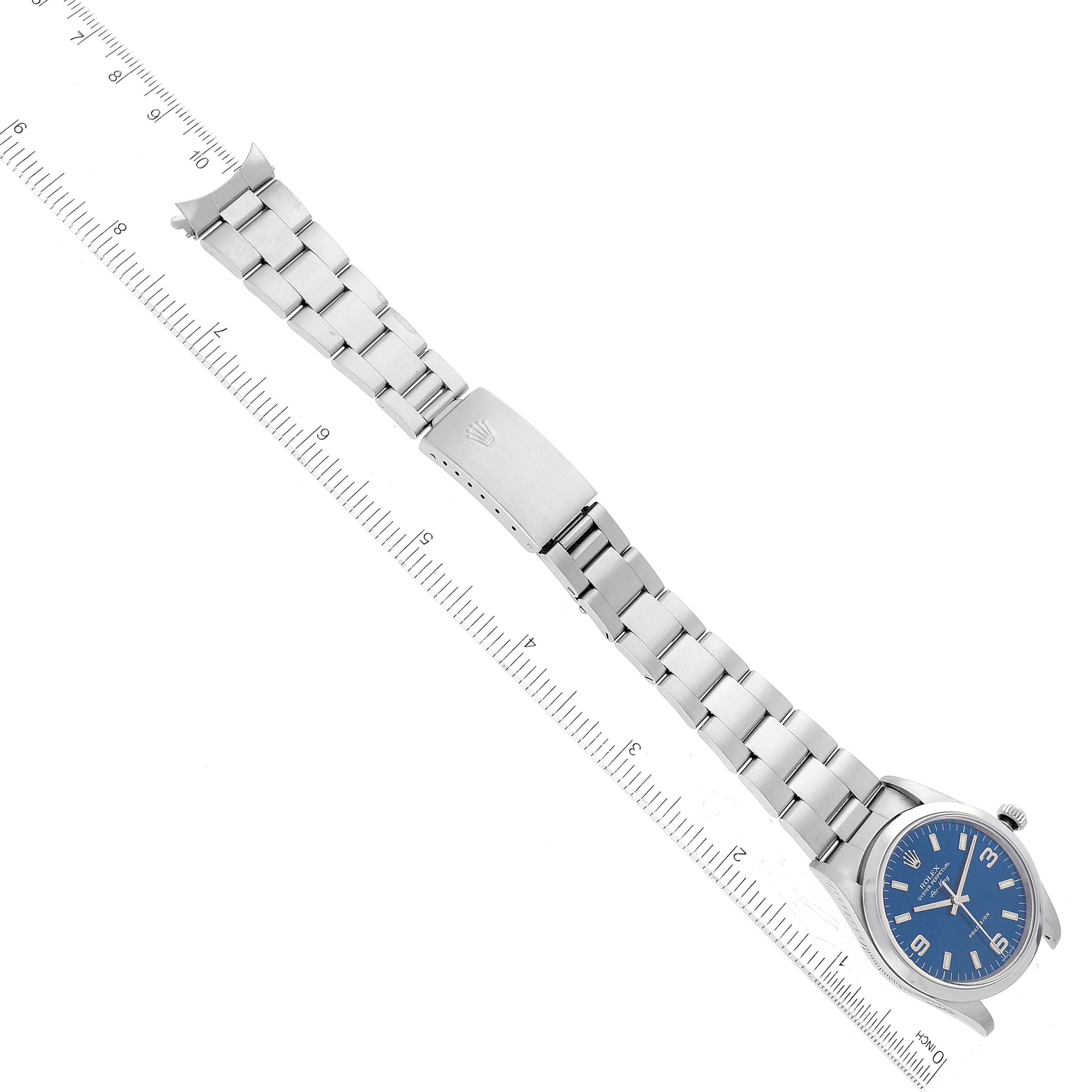 The image shows a Rolex Air-King 14000 Men's Stainless Steel Blue Dial 14000 Men's Stainless Steel Blue Dial watch laid flat, displaying its face, bracelet, and clasp alongside a ruler for scale.