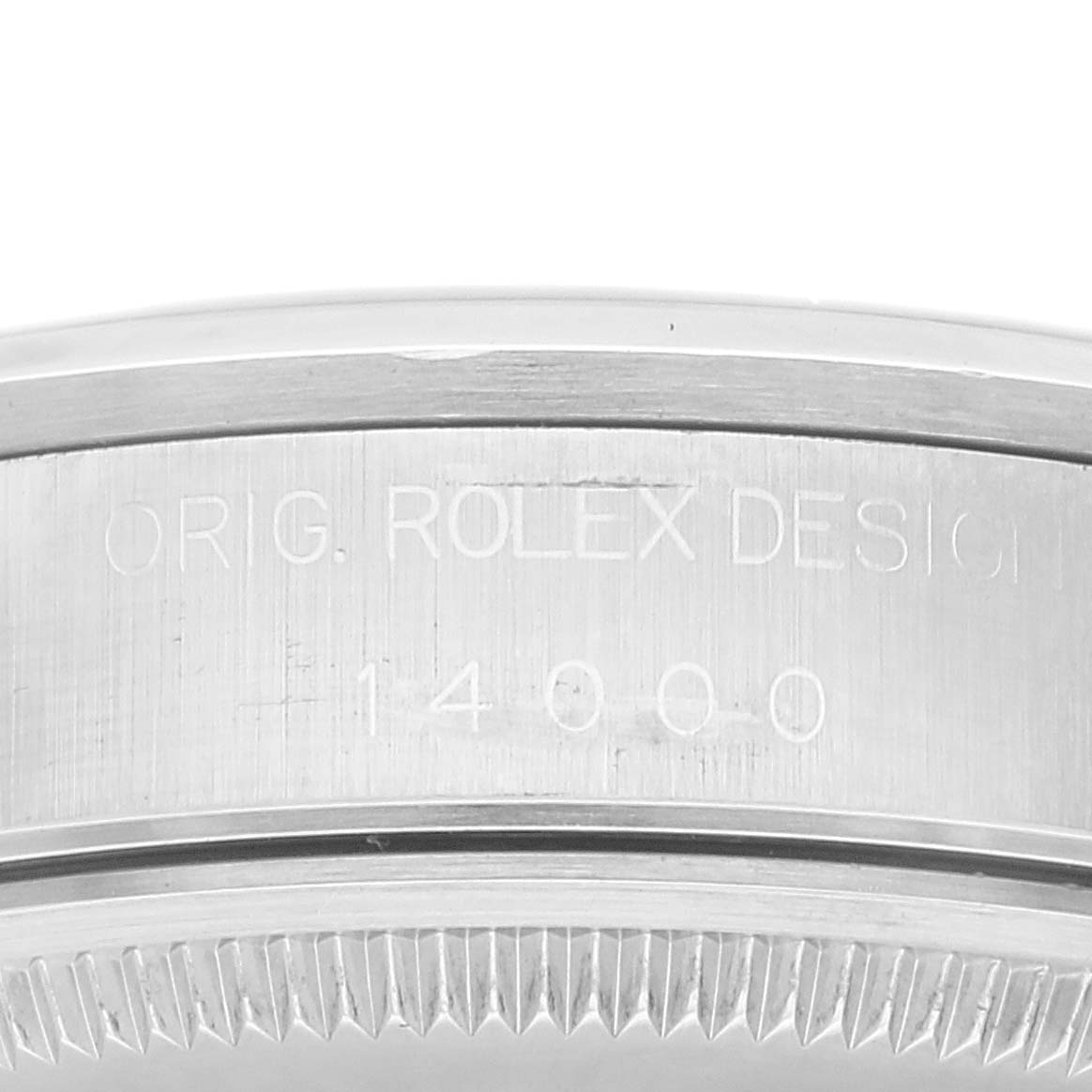 The image shows a close-up angle of the case back of an Air-King model by Rolex, highlighting the model number engraving.