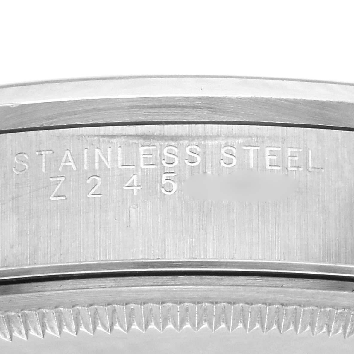 The image shows a close-up of the side engraving on a Rolex Air-King 14000M Men's Stainless Steel Blue Dial 14000M Men's Stainless Steel Blue Dial watch, revealing "STAINLESS STEEL Z245."