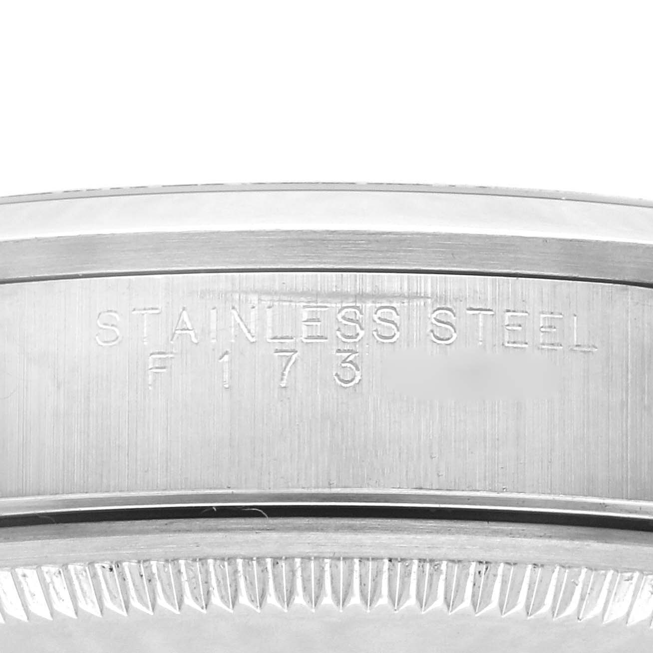 The image shows the side profile of a Rolex Air-King 14000M Men's Stainless Steel Silver Dial 14000M Men's Stainless Steel Silver Dial watch case, highlighting the stainless steel material and engraved details.