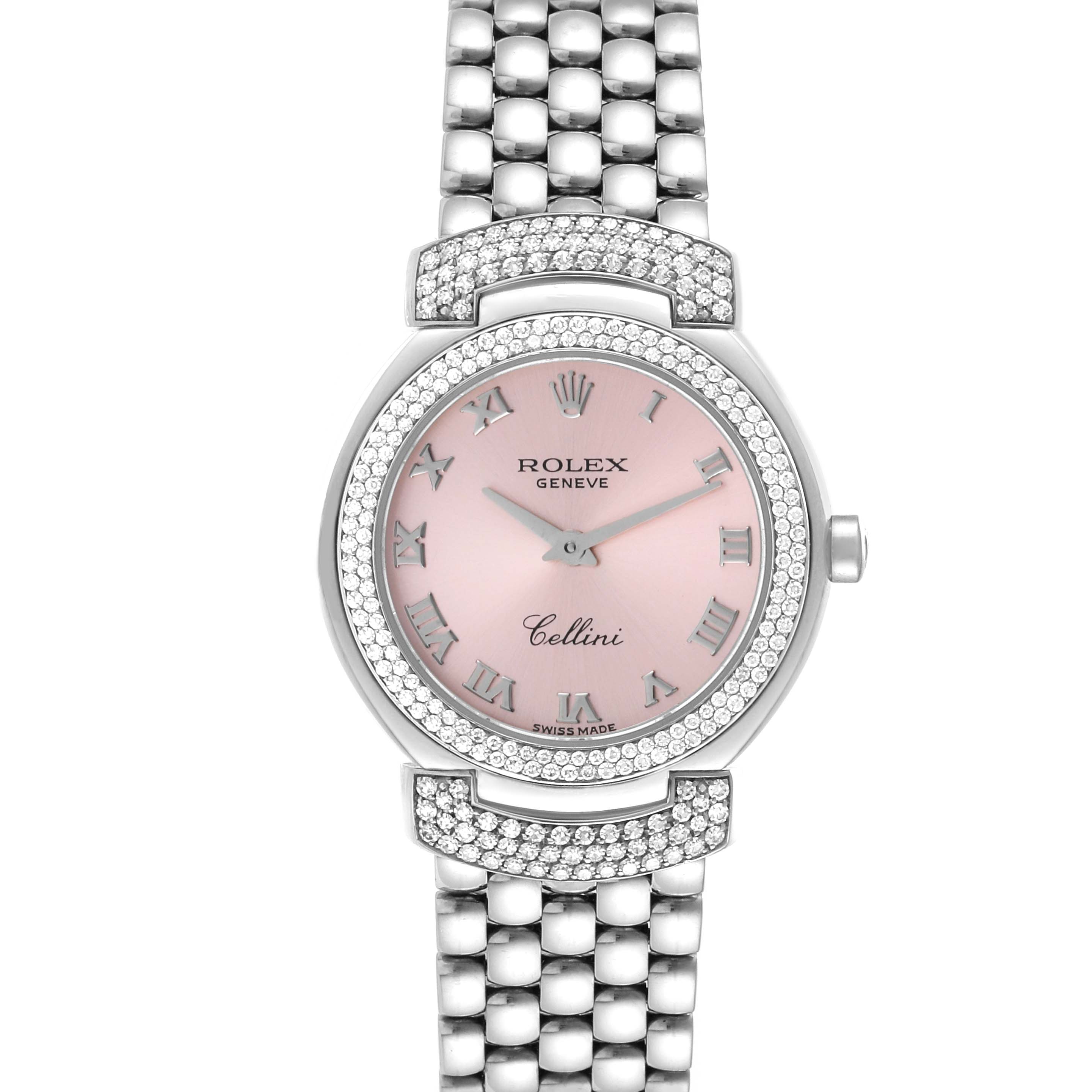 This image shows the front view of a Rolex Cellini 6673 Women
s White Gold Pink Dial 6673 Women
s White Gold Pink Dial watch featuring a pink dial, Roman numerals, and a diamond-studded bezel and bracelet.