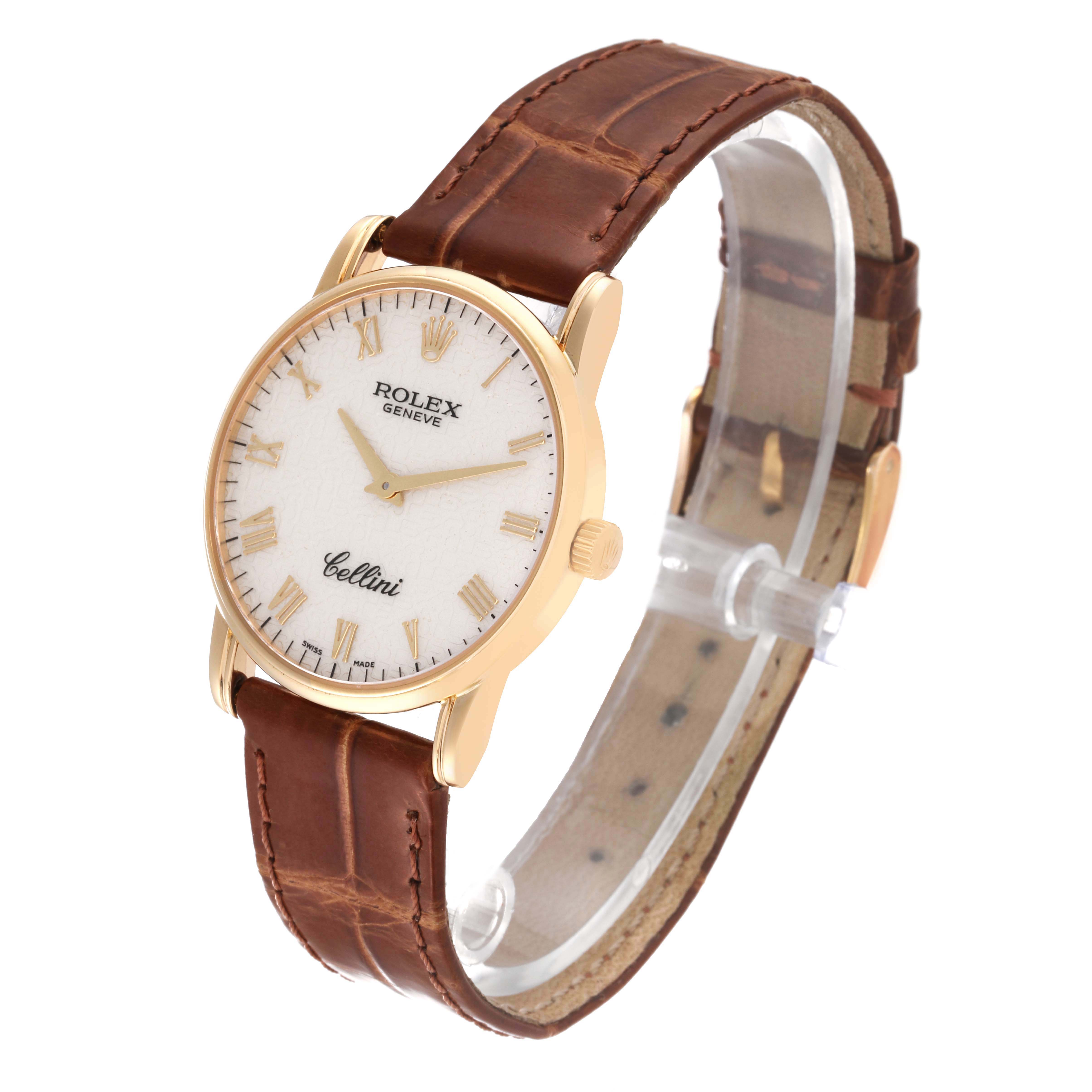The Rolex Cellini 5116 Men's Yellow Gold White Dial 5116 Men's Yellow Gold White Dial watch is shown at a slight angle, displaying its dial, case, and brown leather strap.