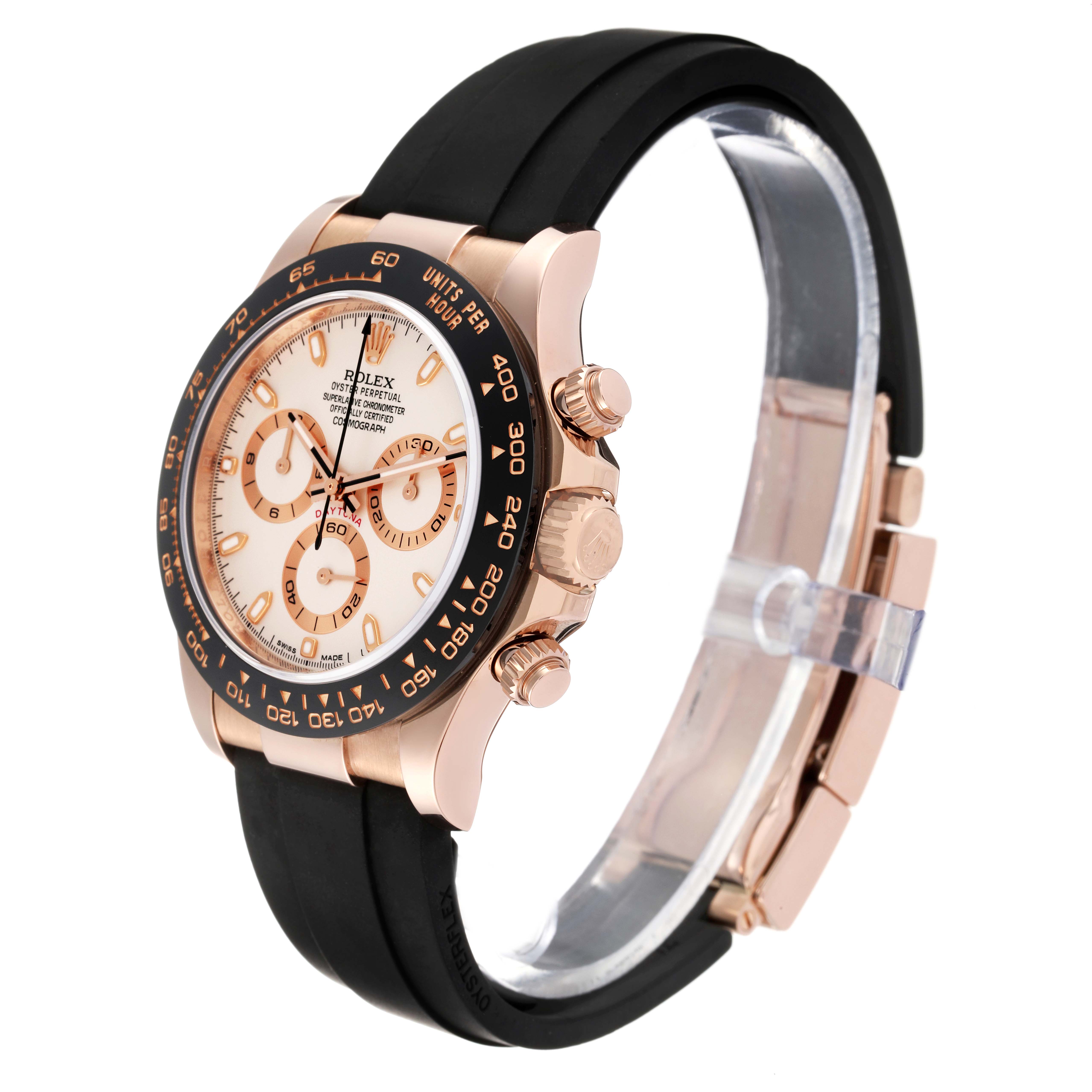The Rolex Daytona 116515LN Men's Rose Gold Silver Dial 116515LN Men's Rose Gold Silver Dial watch is shown at an oblique angle, highlighting its dial, bezel, crown, pushers, and black rubber strap.