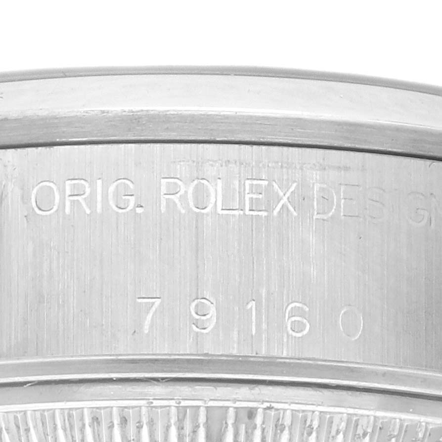 This image shows the side view of a Rolex Date 79160 Women's Stainless Steel Blue Dial 79160 Women's Stainless Steel Blue Dial watch, highlighting the engraved "Orig. Rolex Design" and model number 79160.