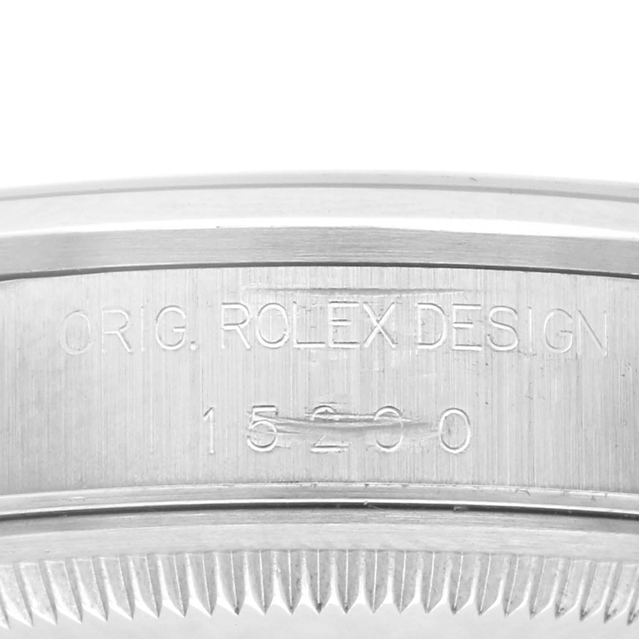 The image shows the engraved side of the Rolex Date 15200 Men's Stainless Steel Blue Dial 15200 Men's Stainless Steel Blue Dial model's case, featuring "ROLEX DESIGN" and the model number.
