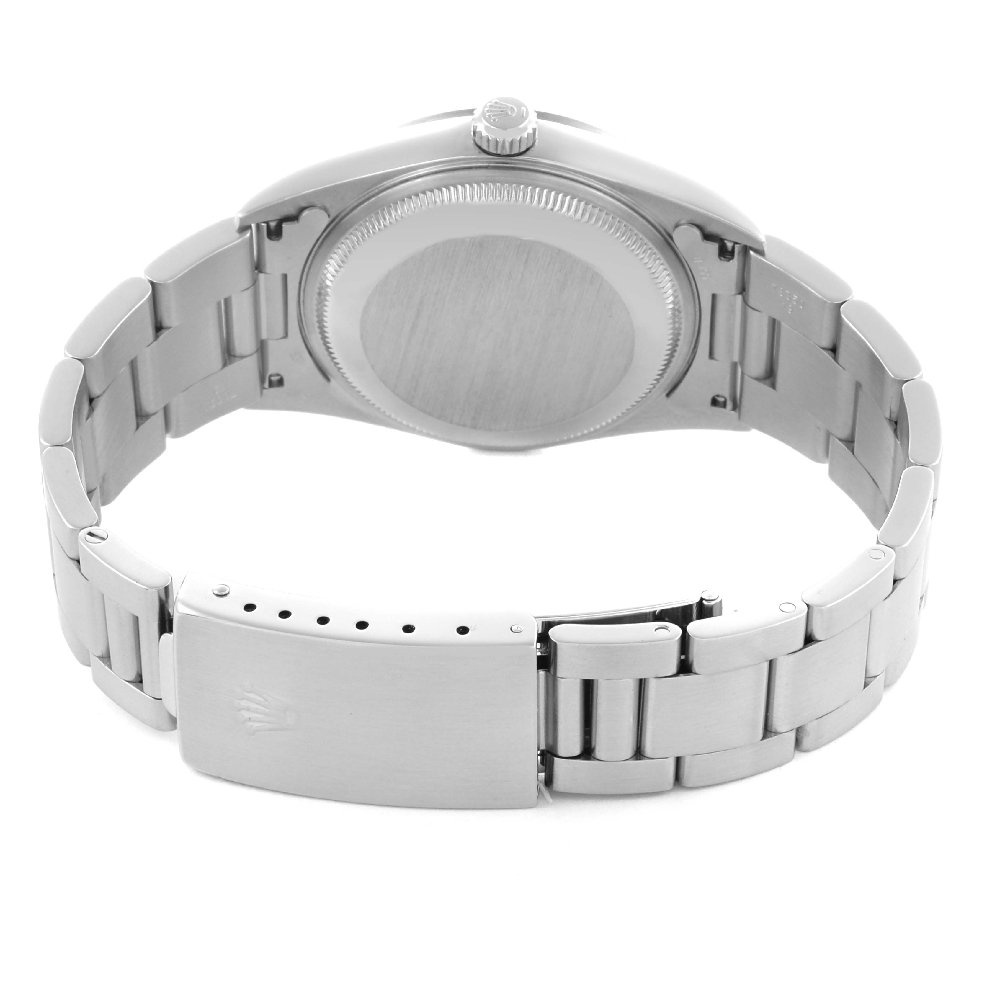 The Rolex Date 15200 Men's Stainless Steel White Dial 15200 Men's Stainless Steel White Dial watch is shown from the back, highlighting its case, crown, and bracelet with clasp.