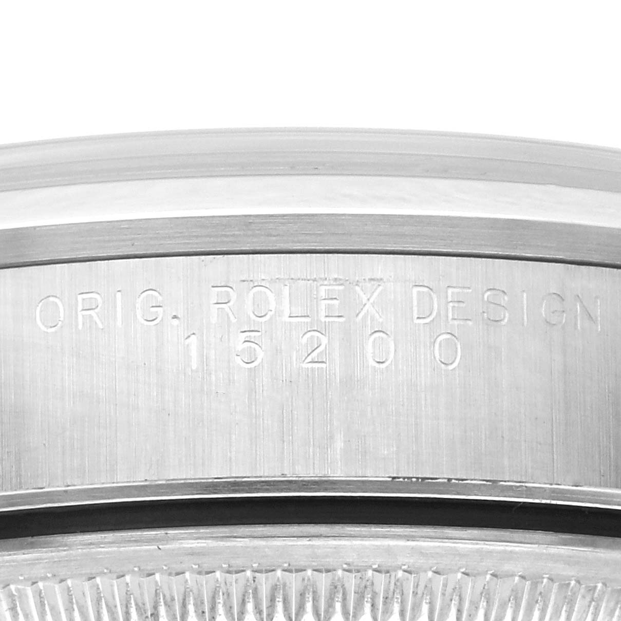 The image shows a close-up of the side of a Rolex Date 15200 Men's Stainless Steel White Dial 15200 Men's Stainless Steel White Dial model, highlighting its engraved serial and model number.