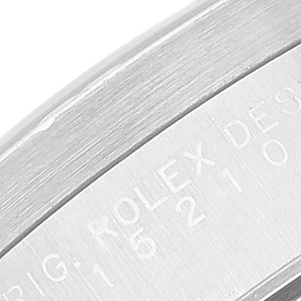 This image shows a close-up view of the engraved inner bezel of a Rolex Date 15210 Men
s Stainless Steel Silver Dial 15210 Men
s Stainless Steel Silver Dial model watch.