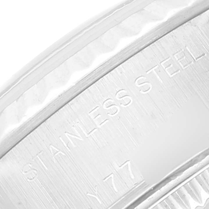 This image shows a close-up angle of the stainless steel part of a Rolex Datejust 79174 Women's Stainless Steel Silver Dial 79174 Women's Stainless Steel Silver Dial watch, highlighting the engravings.