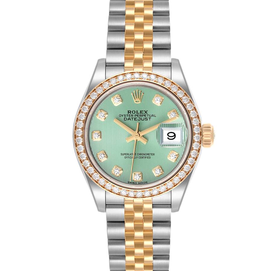 The Rolex Mid-Size watch is shown here from the front, featuring a green dial, diamond bezel, and two-tone bracelet.