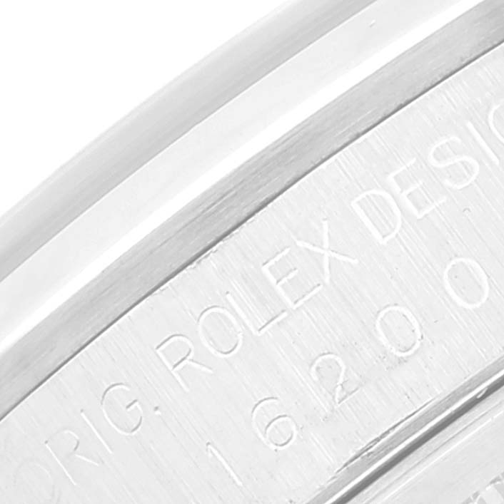 The image shows a close-up of the Rolex Datejust 16200 Men's Stainless Steel Blue Dial 16200 Men's Stainless Steel Blue Dial model's engraving on the case side.