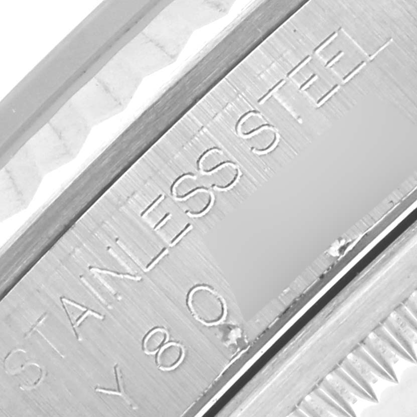 The image shows a close-up of the case side of a Rolex Datejust 16234 Men's Stainless Steel Silver Dial 16234 Men's Stainless Steel Silver Dial, highlighting "STAINLESS STEEL" engraving.
