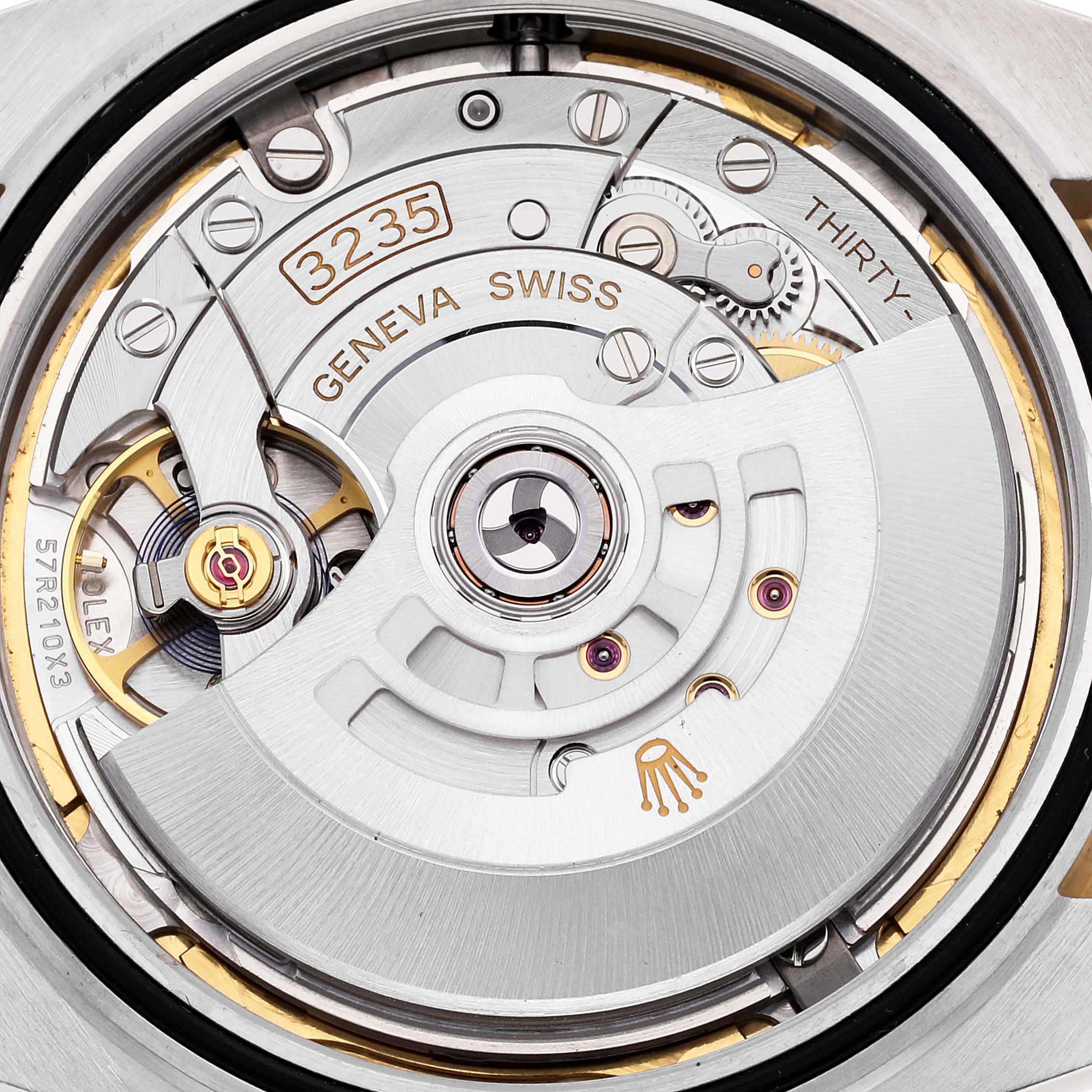 The image shows a close-up view of the movement inside a Rolex Datejust 41 126303 Men's Steel and Gold (two tone) White Dial 126303 Men's Steel and Gold (two tone) White Dial watch, specifically model 3235.
