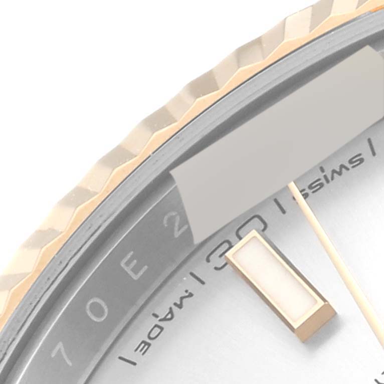 The image shows a close-up of the bezel, markers, date window, and part of the dial of the Rolex Datejust 41 126333 Men's Steel and Gold (two tone) Silver Dial 126333 Men's Steel and Gold (two tone) Silver Dial.