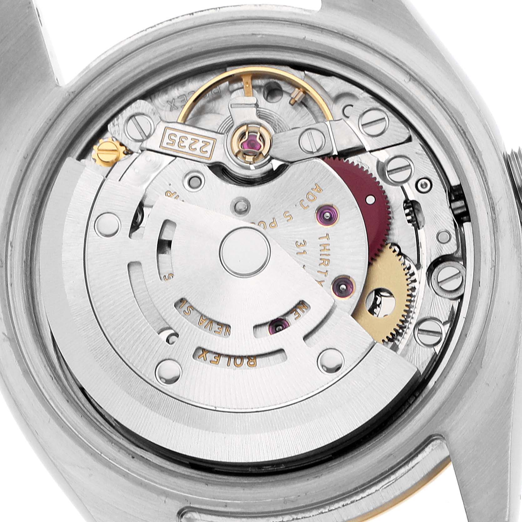 The image shows the Rolex Datejust 179173 Men's Steel and Gold (two tone) Silver Dial watch's movement, displaying gears and mechanical components from a rear angle.