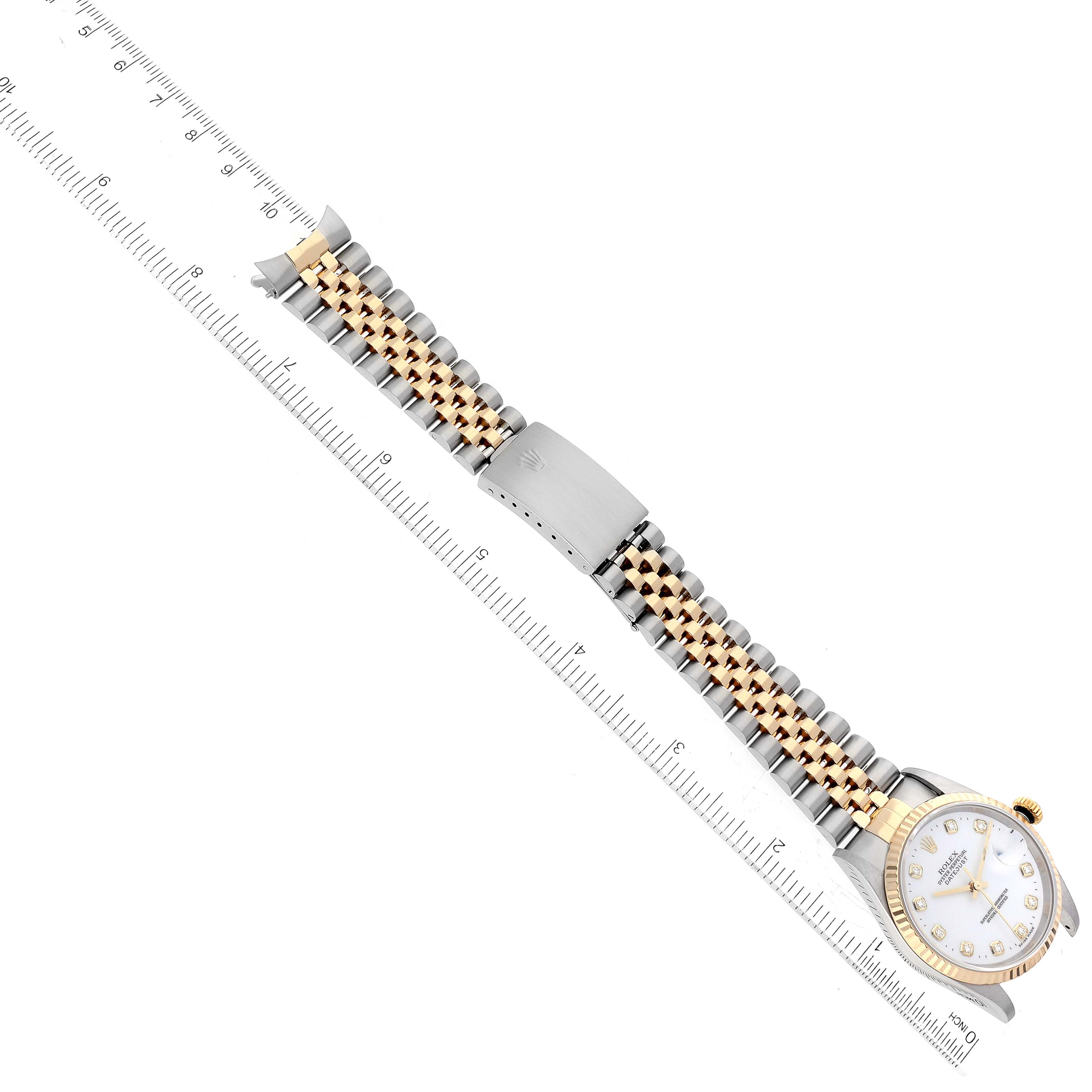 This image shows a top-down view of the Rolex Datejust 16233 Men's Steel and Gold (two tone) White Dial 16233 Men's Steel and Gold (two tone) White Dial watch, displaying its dial, bezel, and bi-tone bracelet.