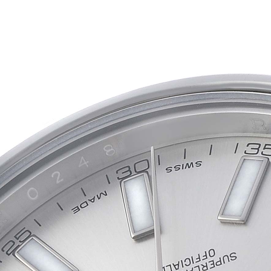 The image shows the upper right portion of the Rolex Datejust 41 116300 Men's Stainless Steel Silver Dial dial, including hour markers and part of the bezel.