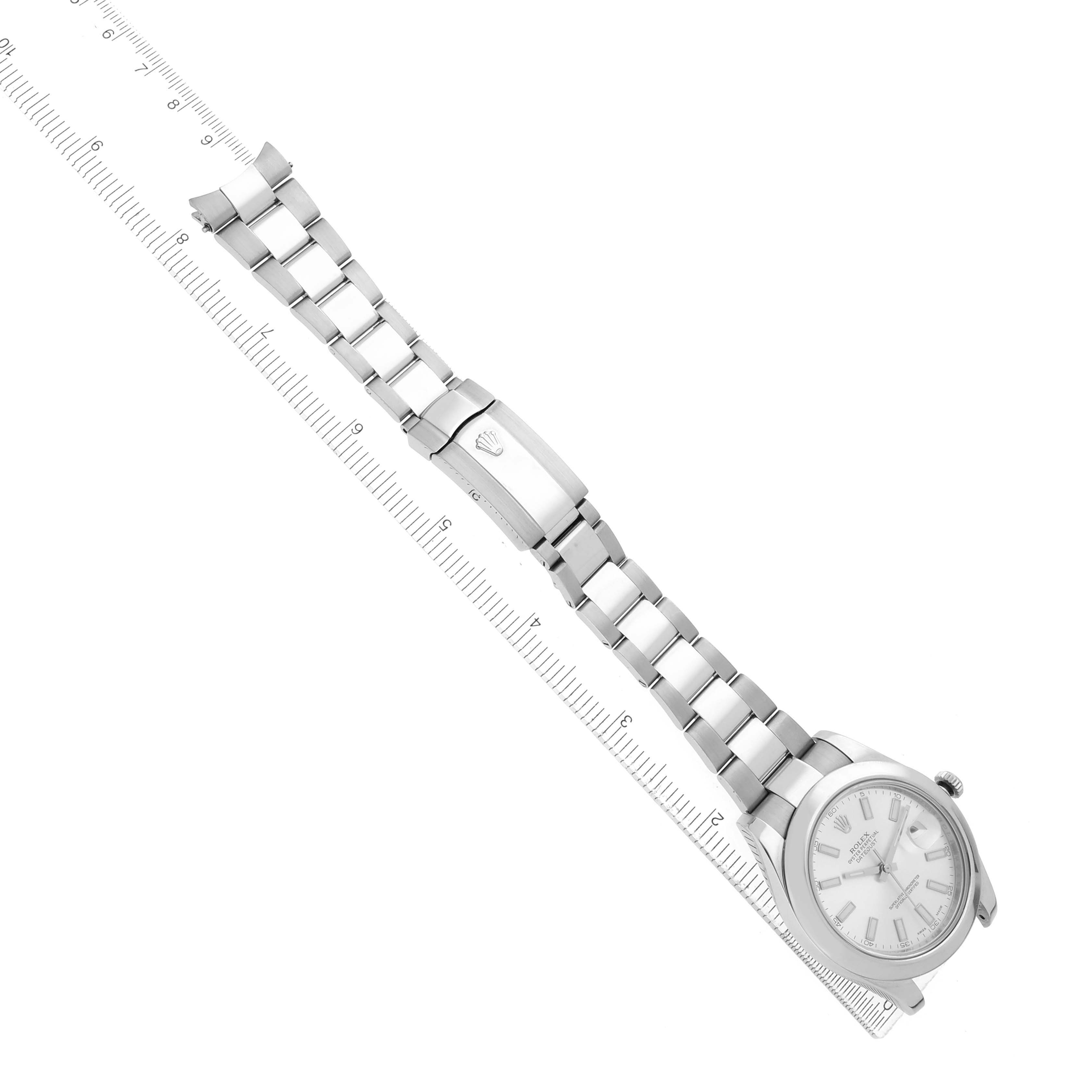 The Rolex Datejust 41 116300 Men's Stainless Steel Silver Dial is displayed diagonally, showing the watch face, bracelet, and clasp against a ruler.