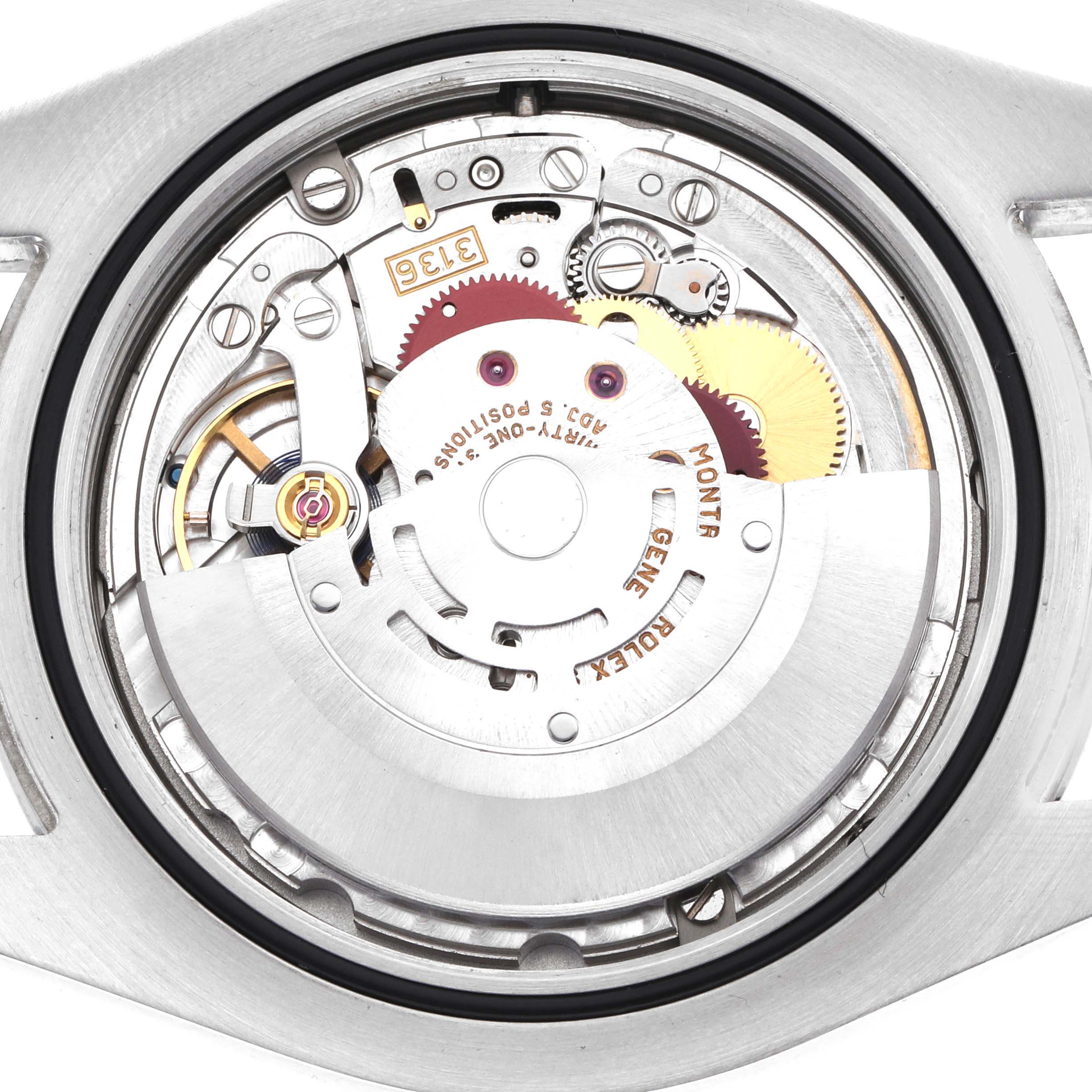The image shows the movement of a Rolex Datejust 41 116300 Men's Stainless Steel Silver Dial watch, viewed from the back, displaying gears and the rotor.