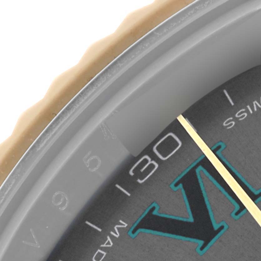 The image shows a close-up of the Rolex Datejust 41 116333 Men's Steel and Gold (two tone) Grey Dial watch face, focusing on the bezel and hour markers.