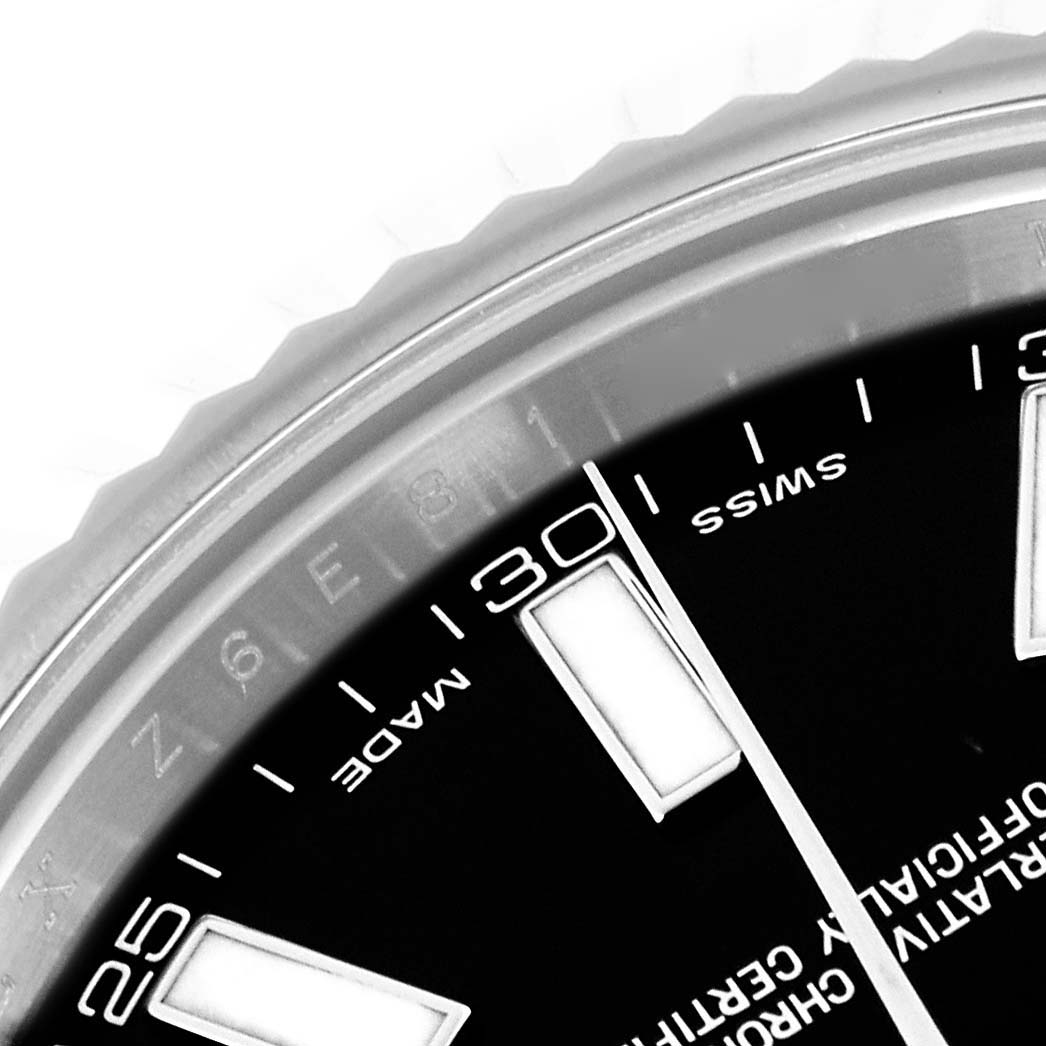 The image shows a close-up of the Rolex Datejust 41 116334 Men's Stainless Steel Black Dial 116334 Men's Stainless Steel Black Dial dial edge, highlighting the hour markers and part of the bezel.