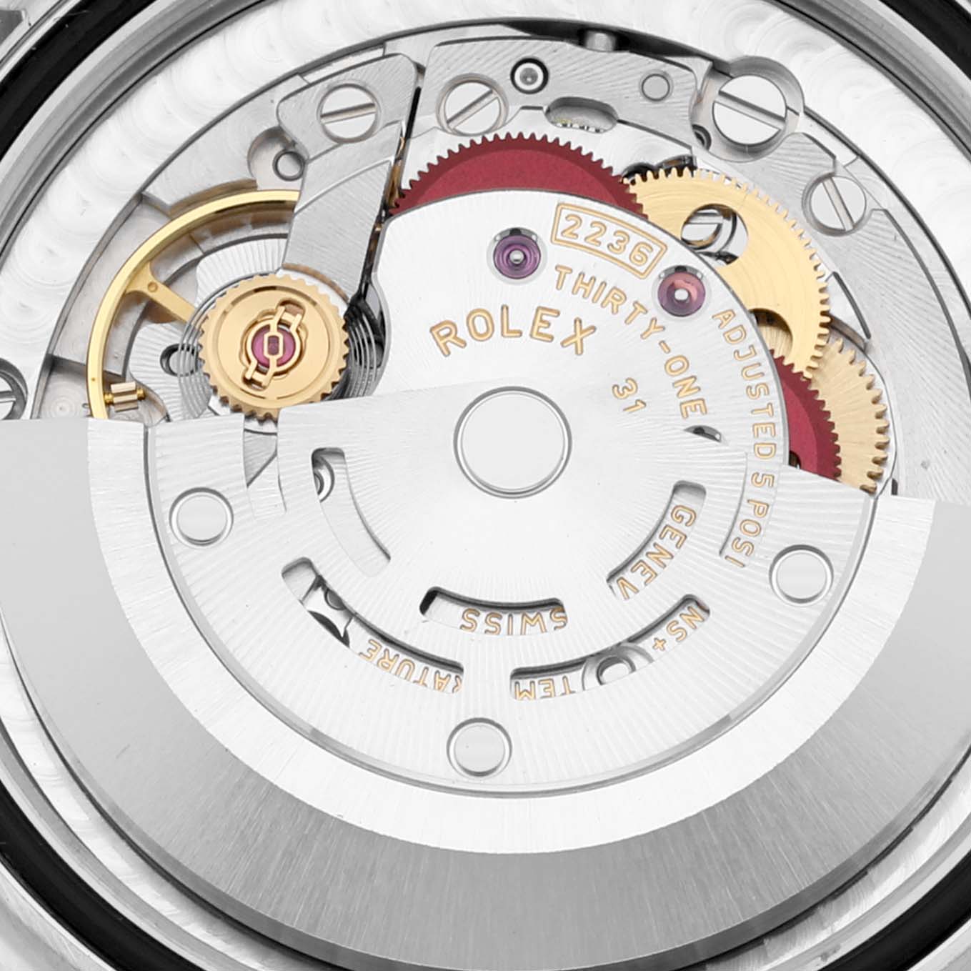 This image shows a close-up of the movement mechanism of the Rolex Mid-Size 278274 Women's Stainless Steel Pink Dial 278274 Women's Stainless Steel Pink Dial model watch.