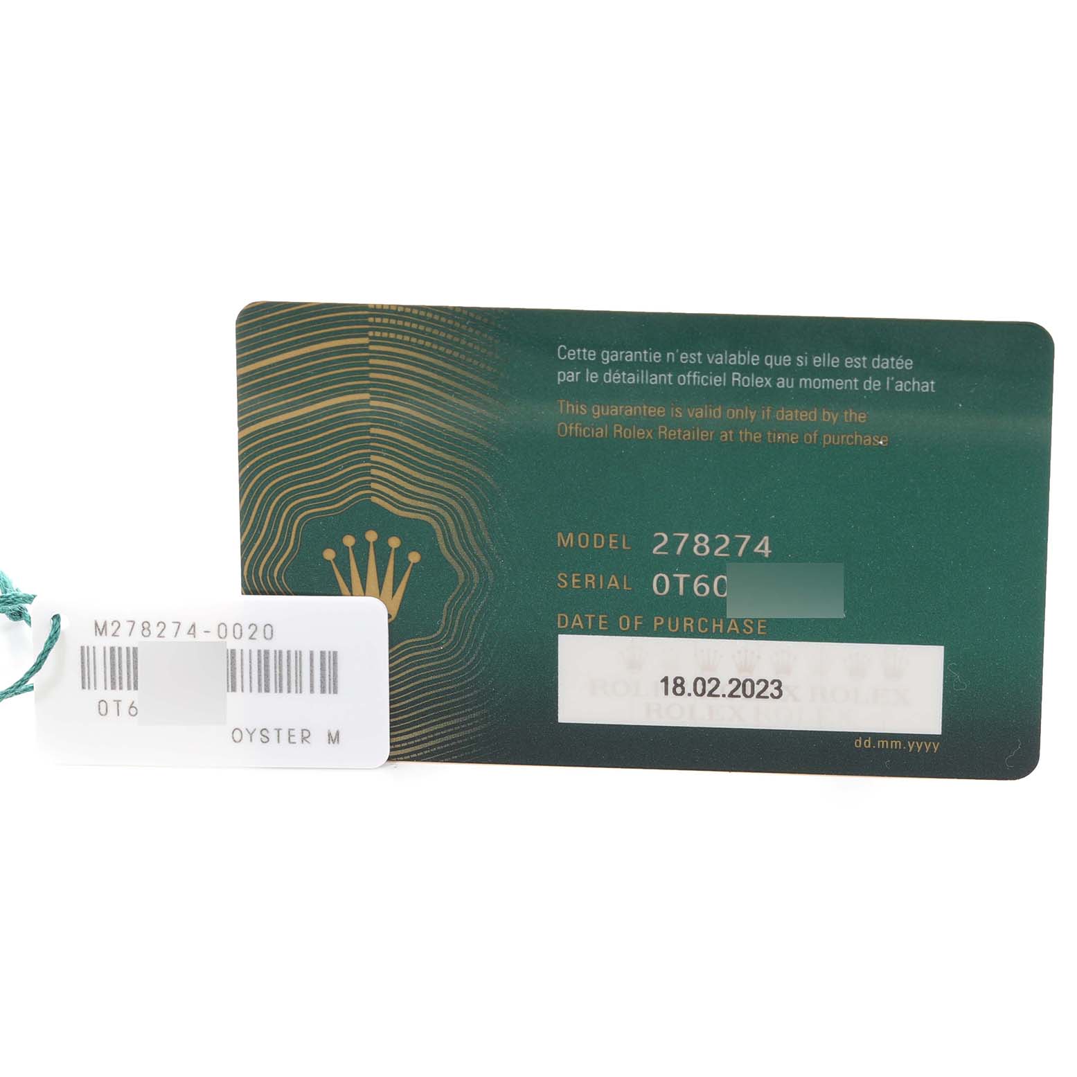 This image shows the warranty card and tag for a Rolex Mid-Size 278274 Women's Stainless Steel Pink Dial 278274 Women's Stainless Steel Pink Dial model 278274 watch.