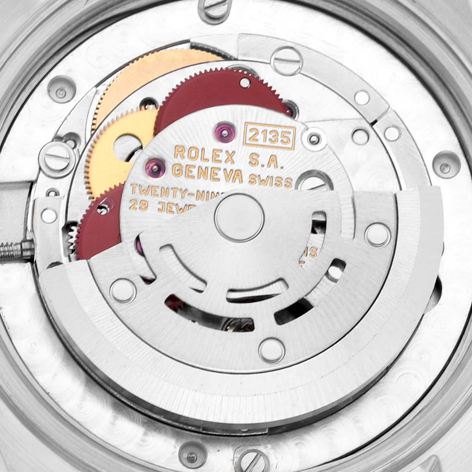 This image shows the internal movement mechanism of a Rolex Mid-Size 68273 Women's Steel and Gold (two tone) Black Dial 68273 Women's Steel and Gold (two tone) Black Dial watch, including gears, jewels, and the rotor.