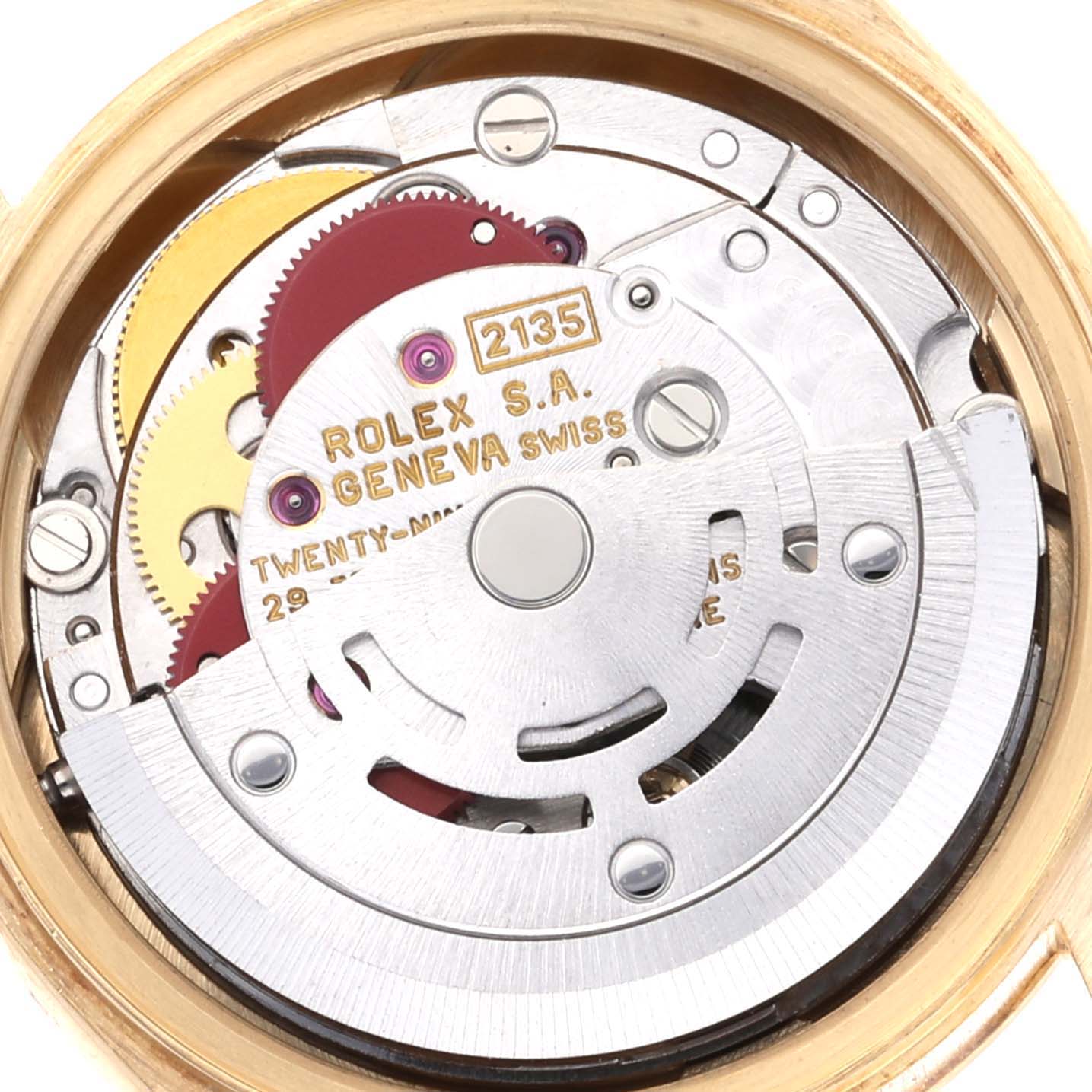 The image shows the internal movement of a Rolex President 69178 Women
s Yellow Gold Champagne Dial 69178 Women
s Yellow Gold Champagne Dial model watch, highlighting gears and the rotor mechanism.
