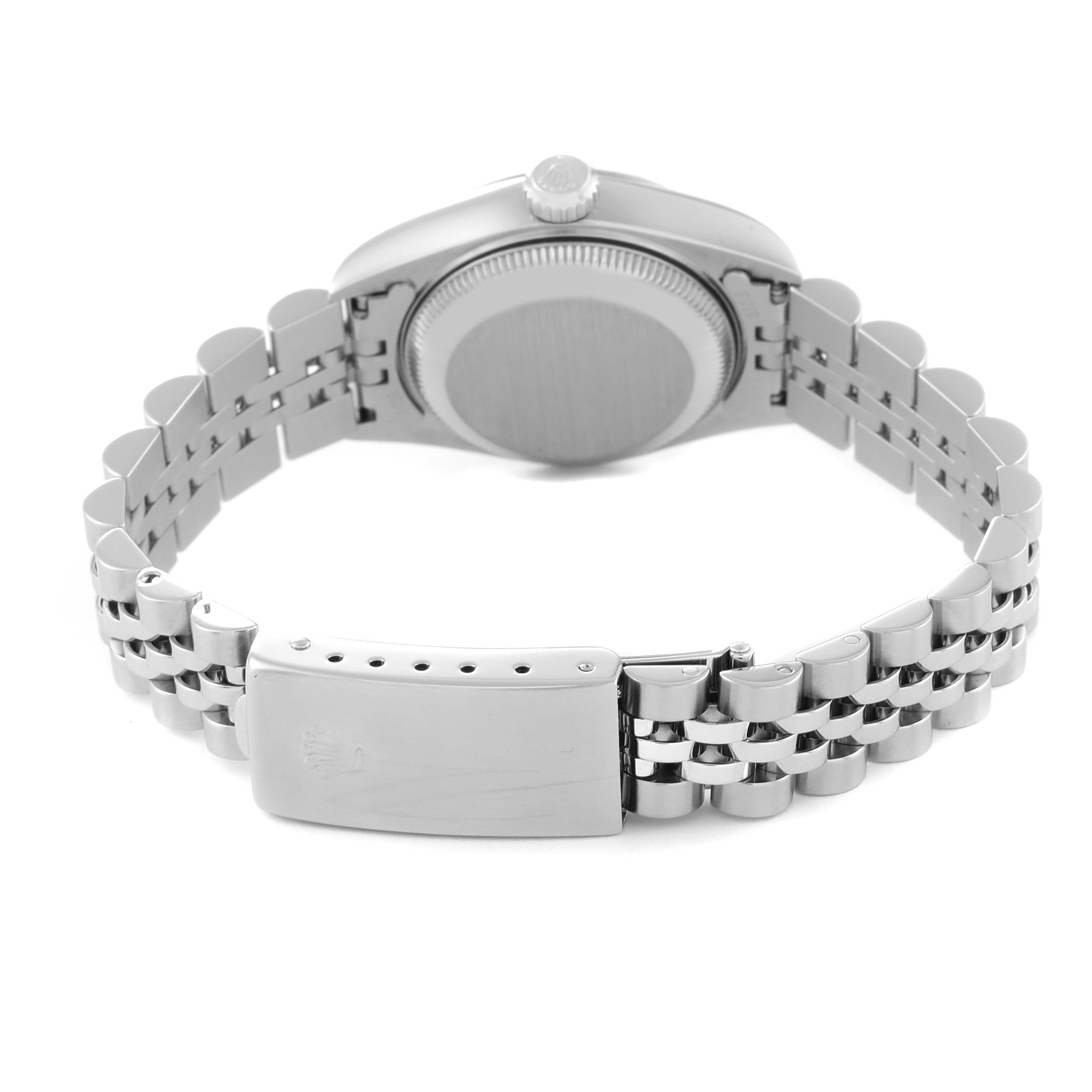 The image shows the back view of a Rolex Datejust 69174 Women's Stainless Steel Blue Dial 69174 Women's Stainless Steel Blue Dial watch, highlighting the case back and bracelet clasp.