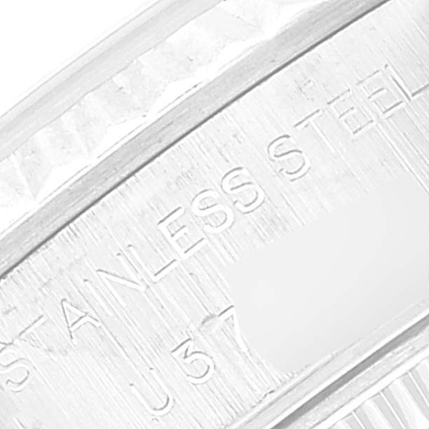 The image shows a close-up of the stainless steel inner bezel of a Rolex Datejust 69174 Women's Stainless Steel Silver Dial 69174 Women's Stainless Steel Silver Dial watch.