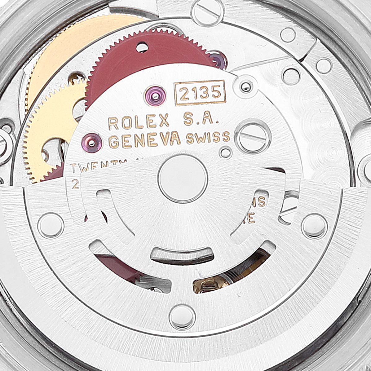This image shows a close-up of the movement inside a Rolex Datejust 69174 Women's Stainless Steel Silver Dial 69174 Women's Stainless Steel Silver Dial watch, highlighting gears and the rotor.