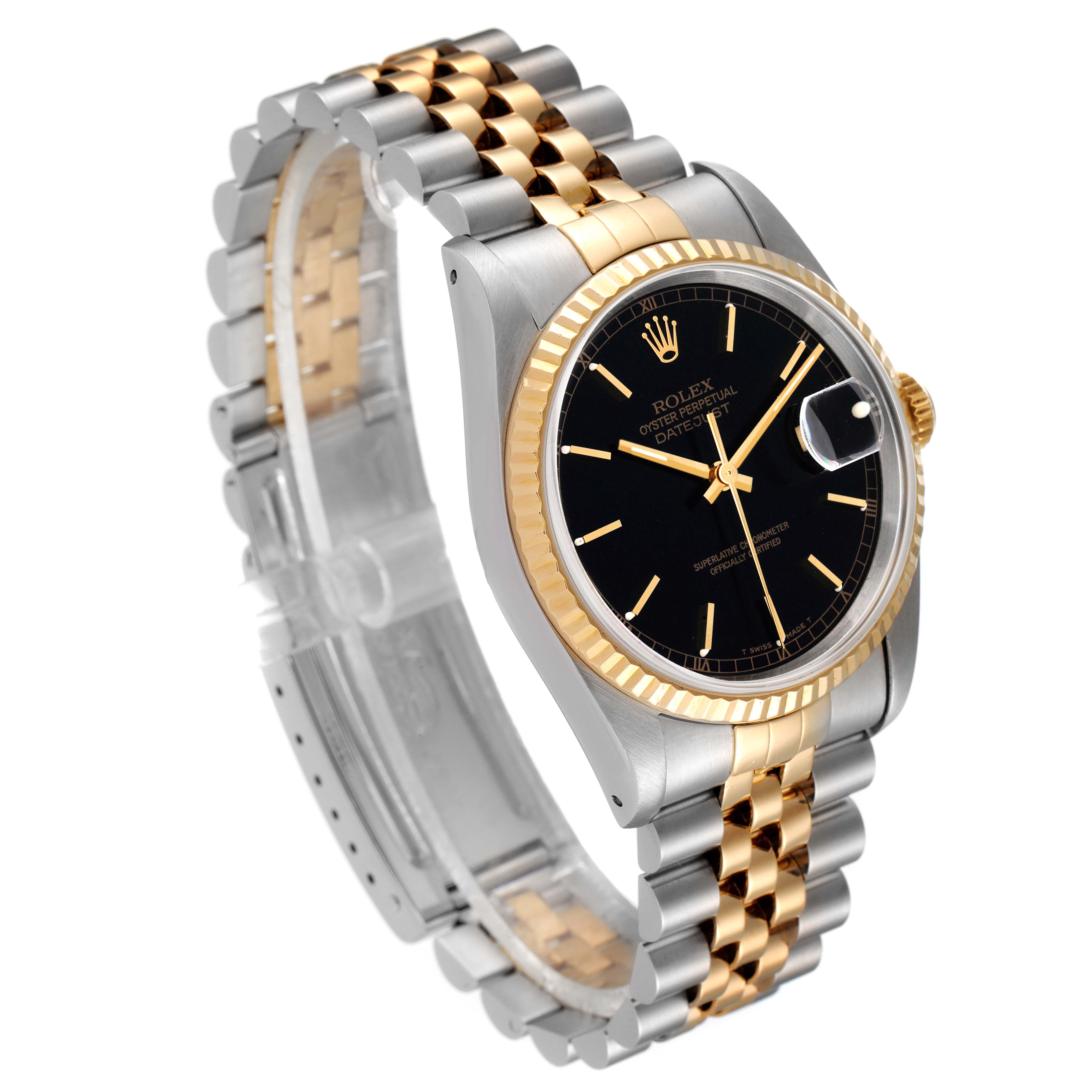 This image shows a Rolex Datejust 16233 Men's Steel and Gold (two tone) Black Dial 16233 Men's Steel and Gold (two tone) Black Dial watch at an angled side view, displaying its black dial, two-tone bracelet, and fluted bezel.