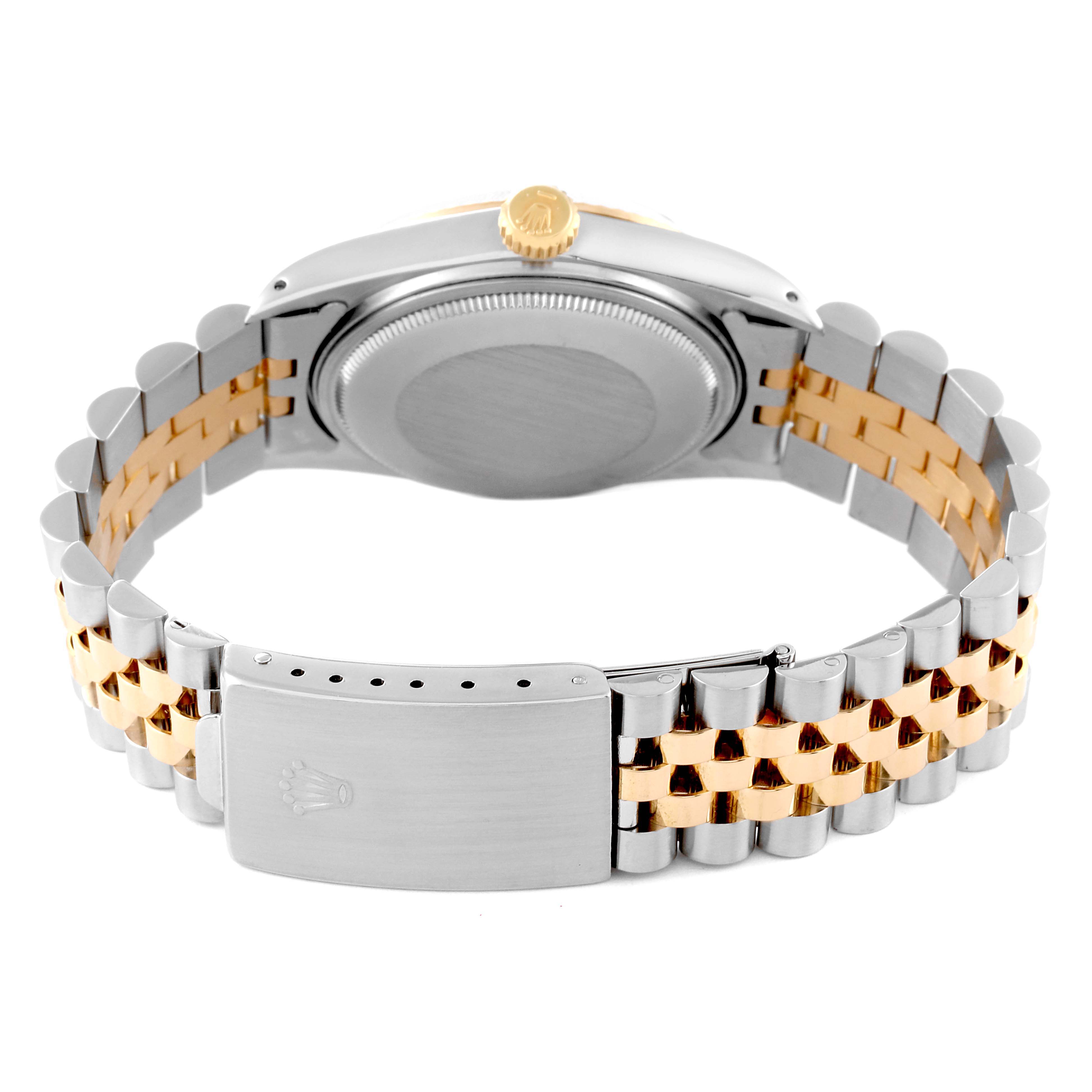 The image displays the back of a Rolex Datejust 16013 Men's Steel and Gold (two tone) White Dial 16013 Men's Steel and Gold (two tone) White Dial watch, focusing on its bracelet, clasp, and case back.