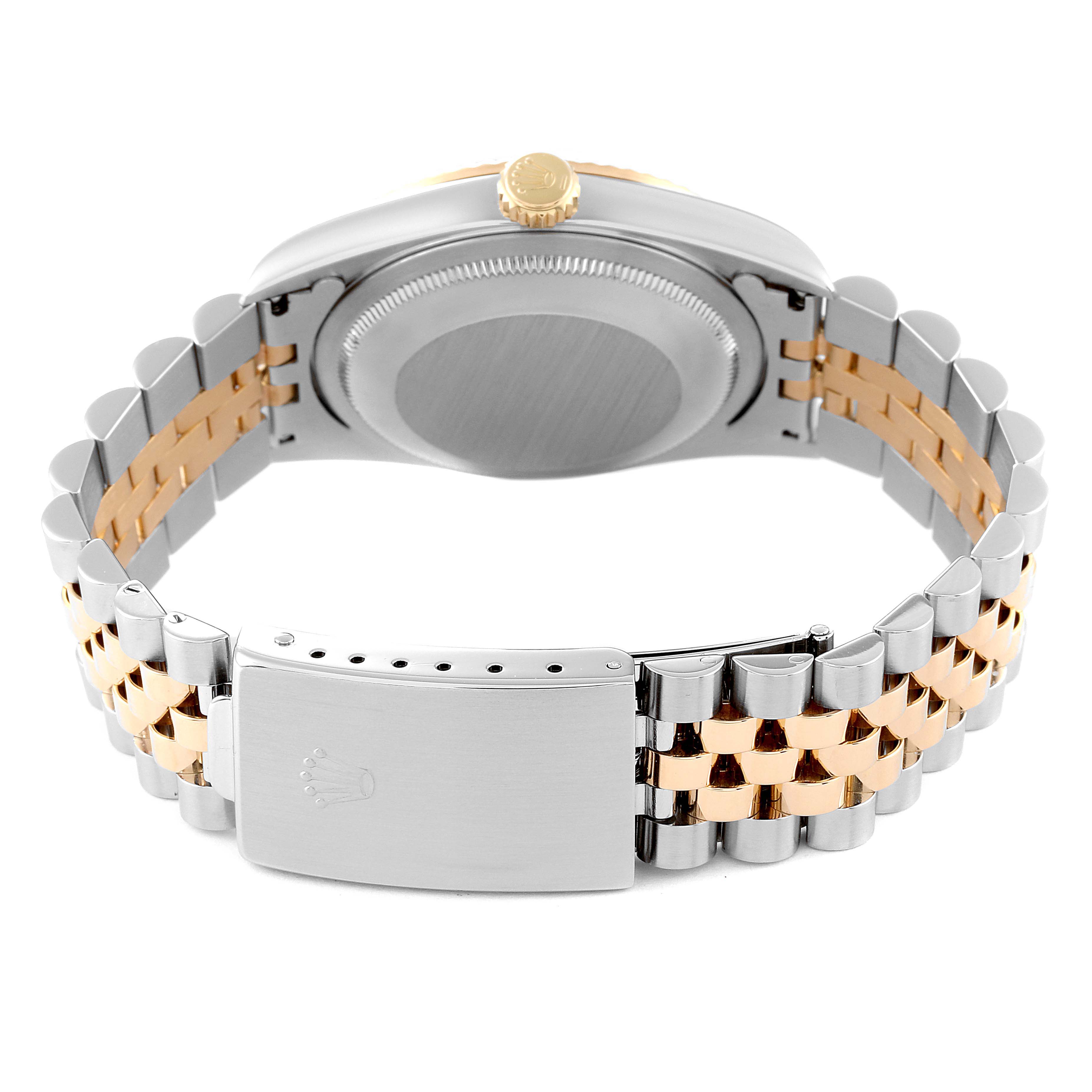 The image shows the back view of the Rolex Datejust 16233 Men's Steel and Gold (two tone) Champagne Dial 16233 Men's Steel and Gold (two tone) Champagne Dial watch's case and two-tone metal bracelet with a clasp.