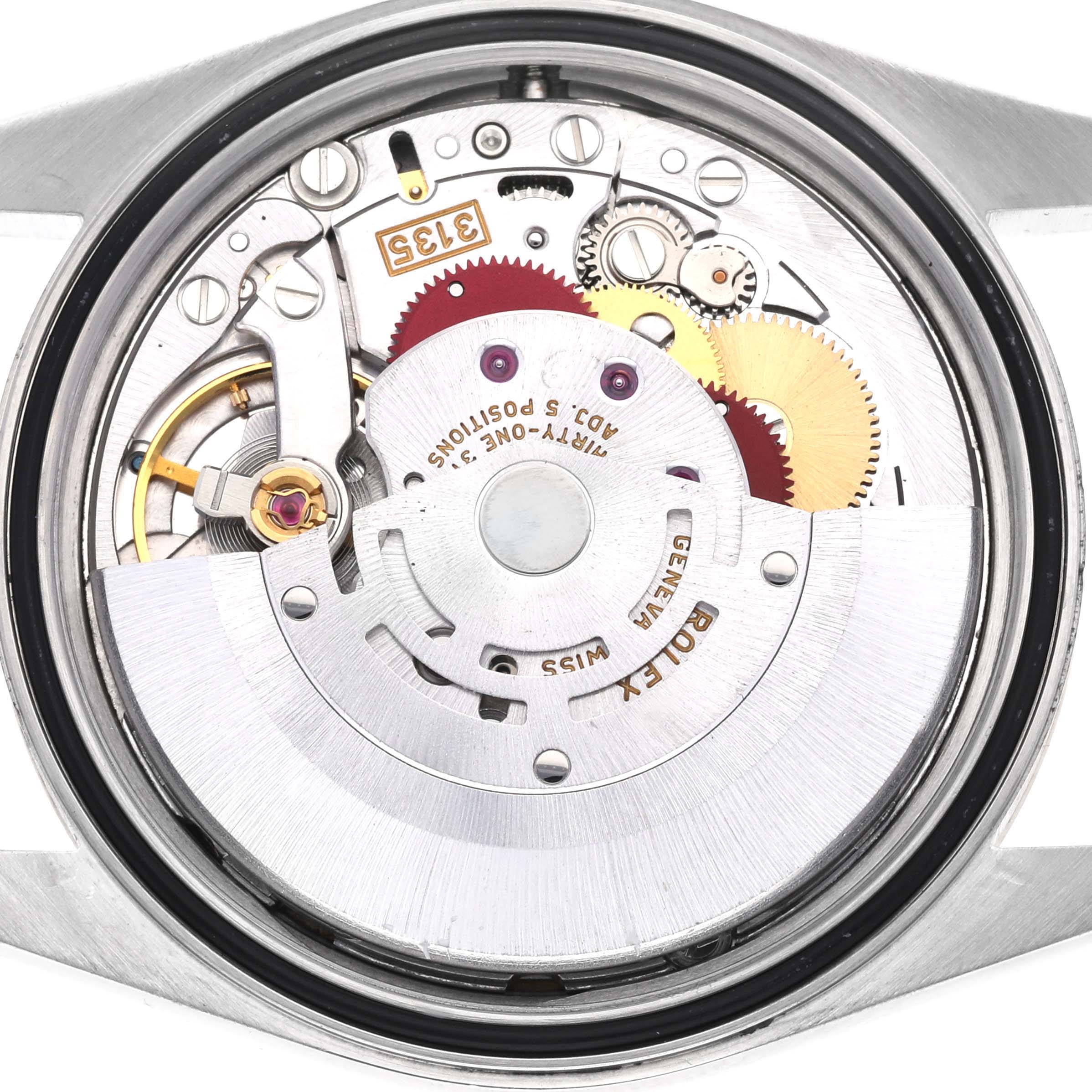 The image shows the inner mechanism of a Rolex Datejust 16233 Men's Steel and Gold (two tone) Champagne Dial 16233 Men's Steel and Gold (two tone) Champagne Dial watch from a back angle, highlighting gears and movement parts.