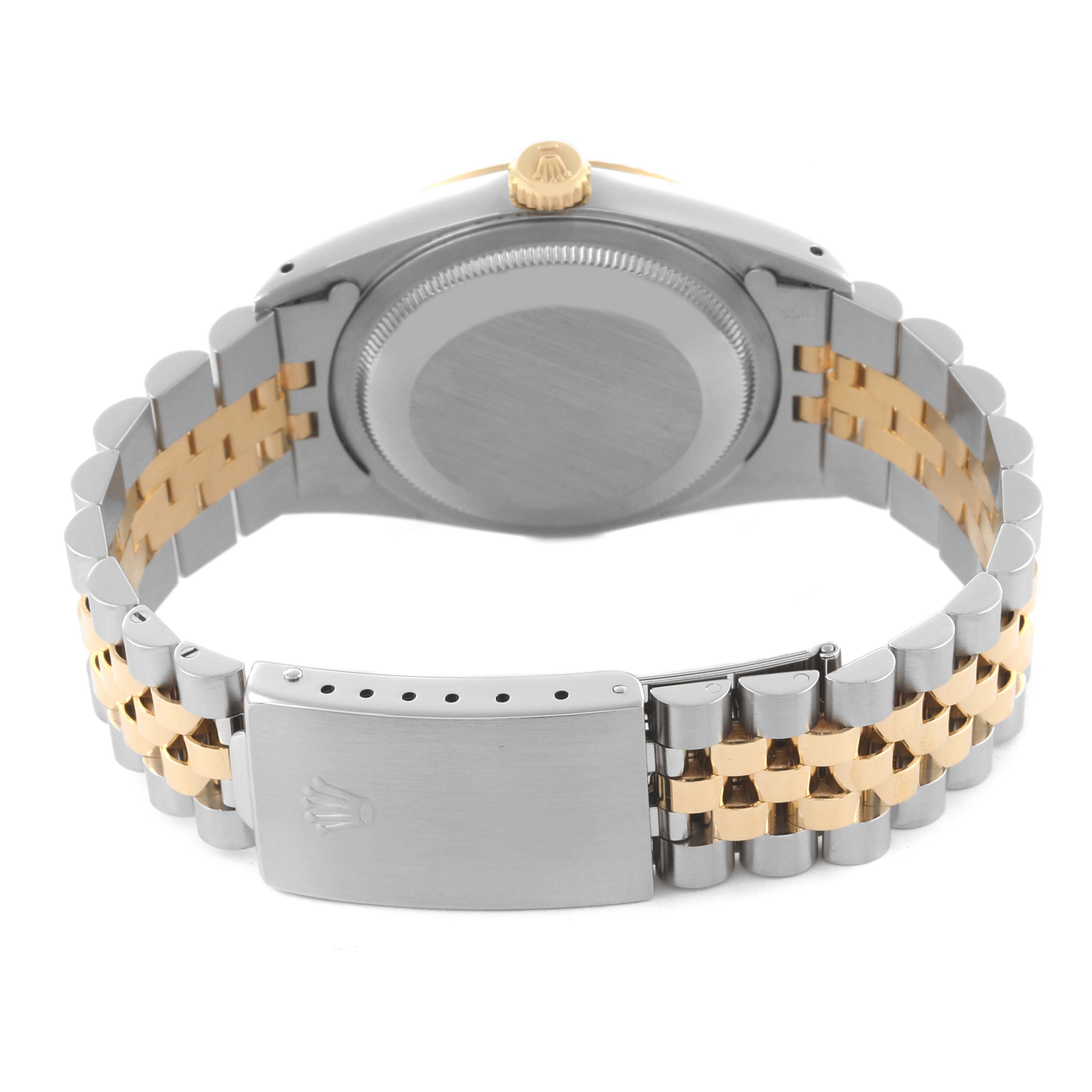 The image shows the back of a Rolex Datejust 16233 Men's Steel and Gold (two tone) Champagne Dial 16233 Men's Steel and Gold (two tone) Champagne Dial watch, highlighting the case, crown, and partially open two-tone bracelet.