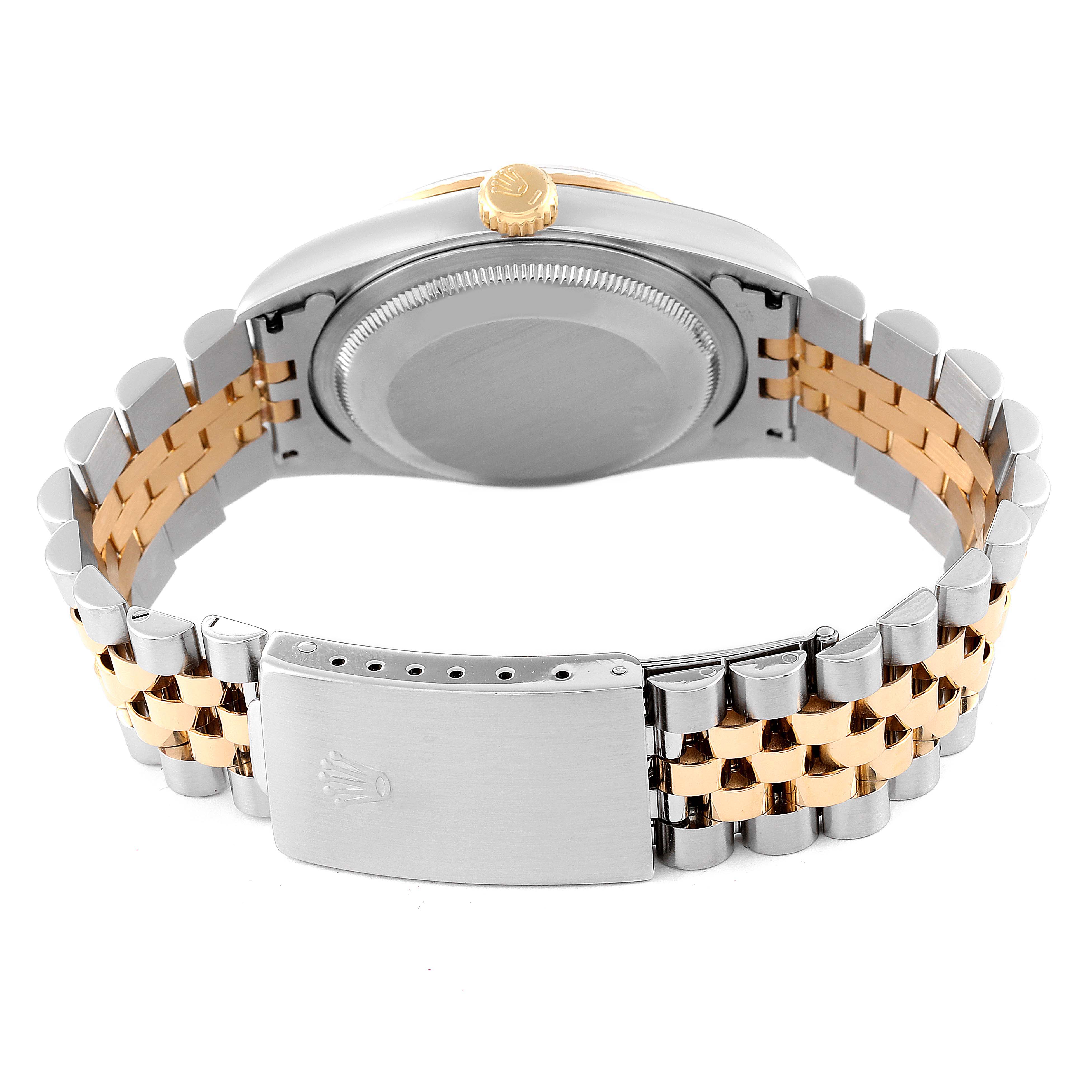 The image shows the back view of a Rolex Datejust 16233 Men's Steel and Gold (two tone) Champagne Dial 16233 Men's Steel and Gold (two tone) Champagne Dial watch, highlighting the case back, crown, and two-tone jubilee bracelet with clasp.