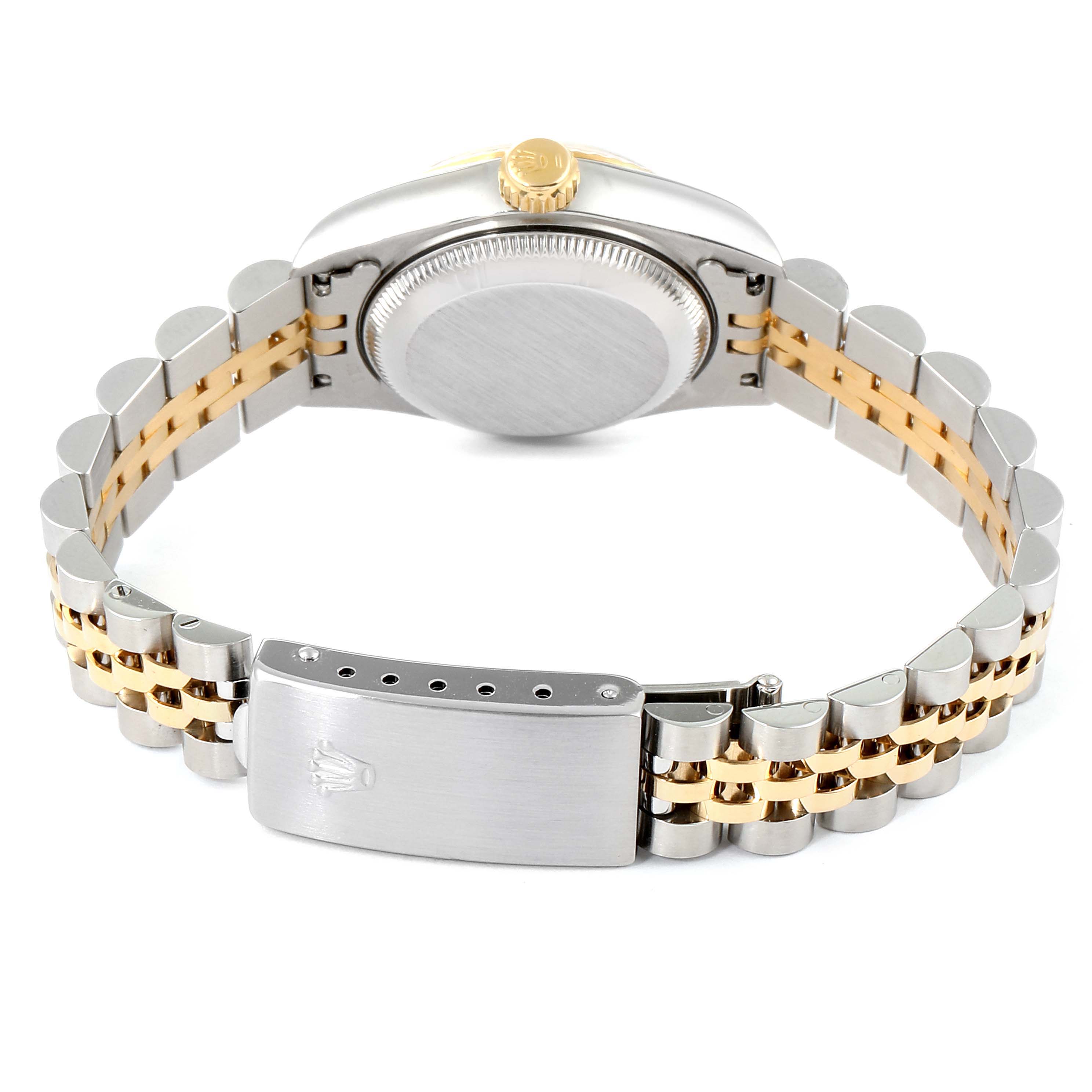 This Rolex Datejust 69173 Women's Steel and Gold (two tone) Champagne Dial 69173 Women's Steel and Gold (two tone) Champagne Dial watch is shown from the back, highlighting the case back, crown, and two-tone bracelet.